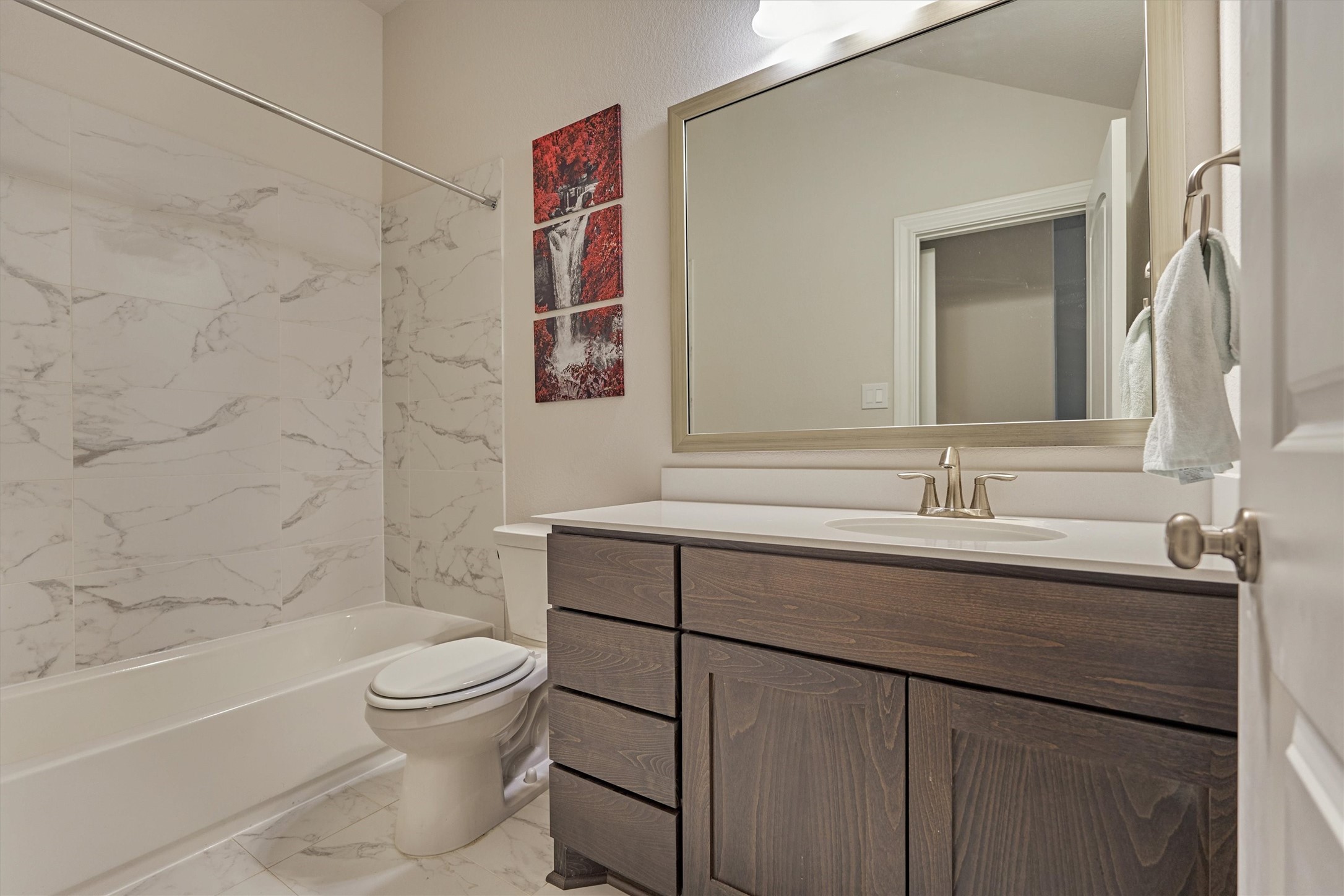 15230 Tree Swallow Court Magnolia, TX 77354 - Photo 34 of 49 a bathroom with a sink a toilet and shower