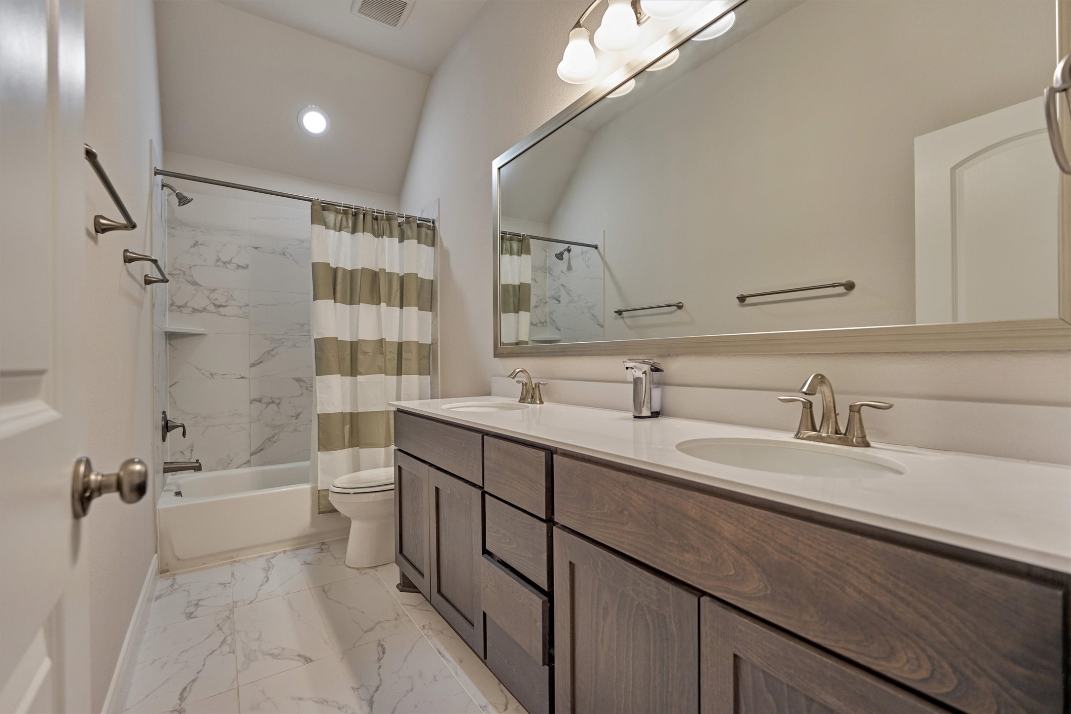 15230 Tree Swallow Court Magnolia, TX 77354 - Photo 36 of 49 a bathroom with a sink a toilet and shower