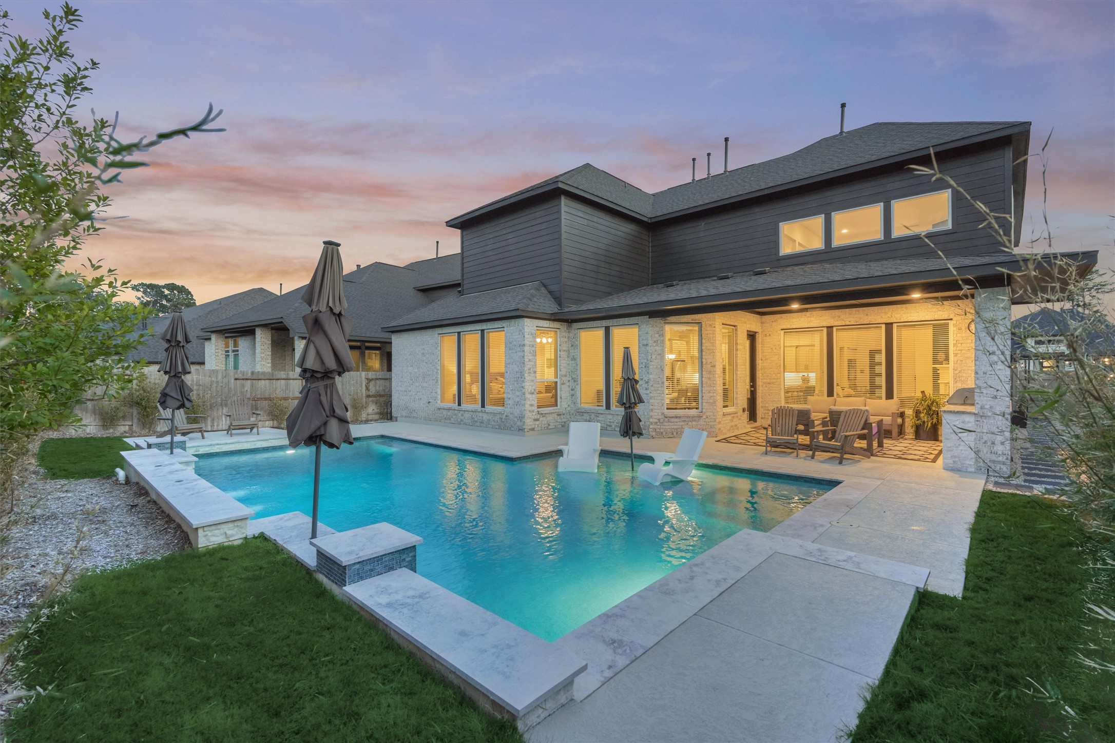 15230 Tree Swallow Court Magnolia, TX 77354 - Photo 40 of 49 a view of a house with pool and chairs