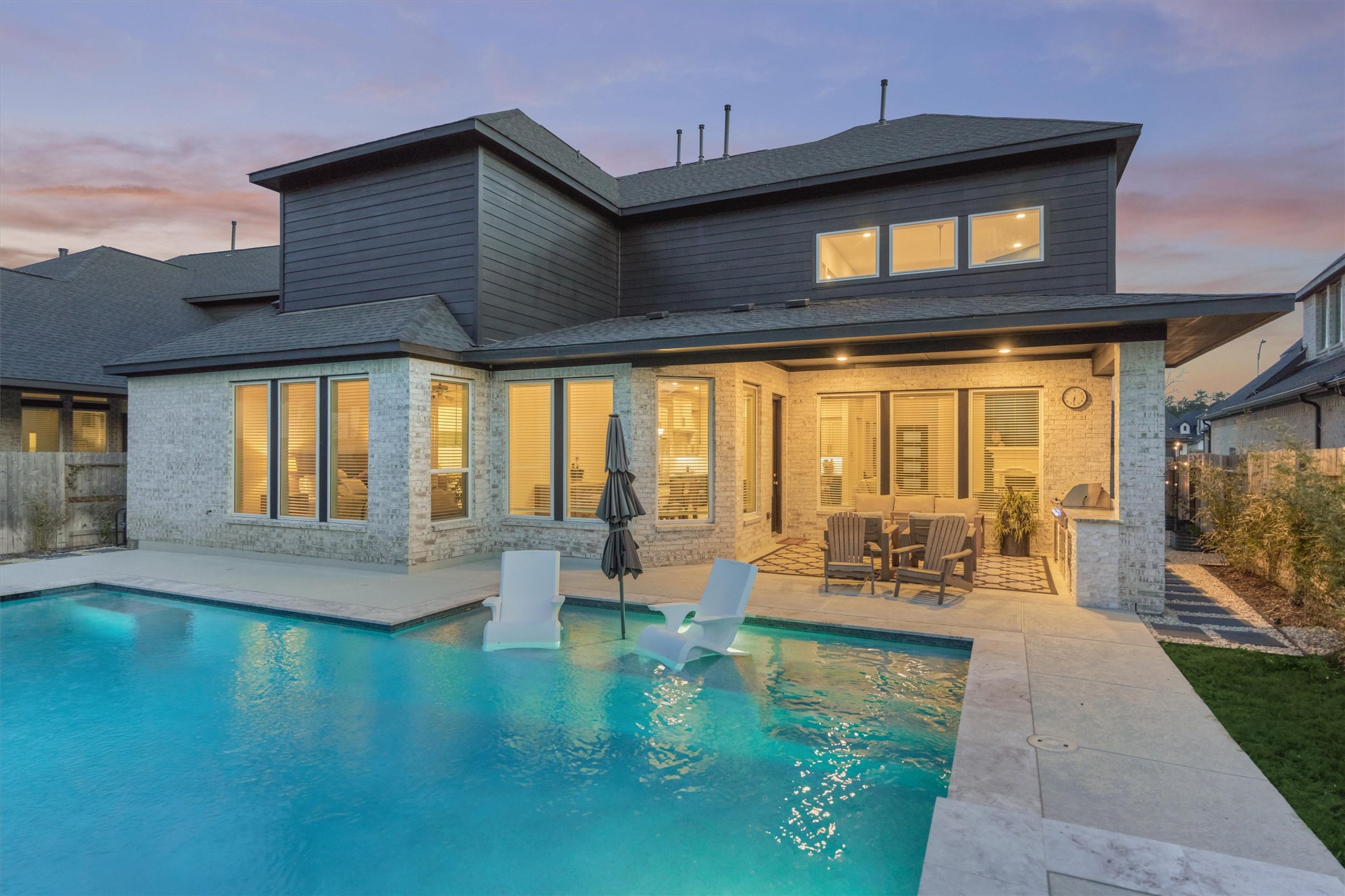 15230 Tree Swallow Court Magnolia, TX 77354 - Photo 41 of 49 a view of a patio with couches chairs and potted plants