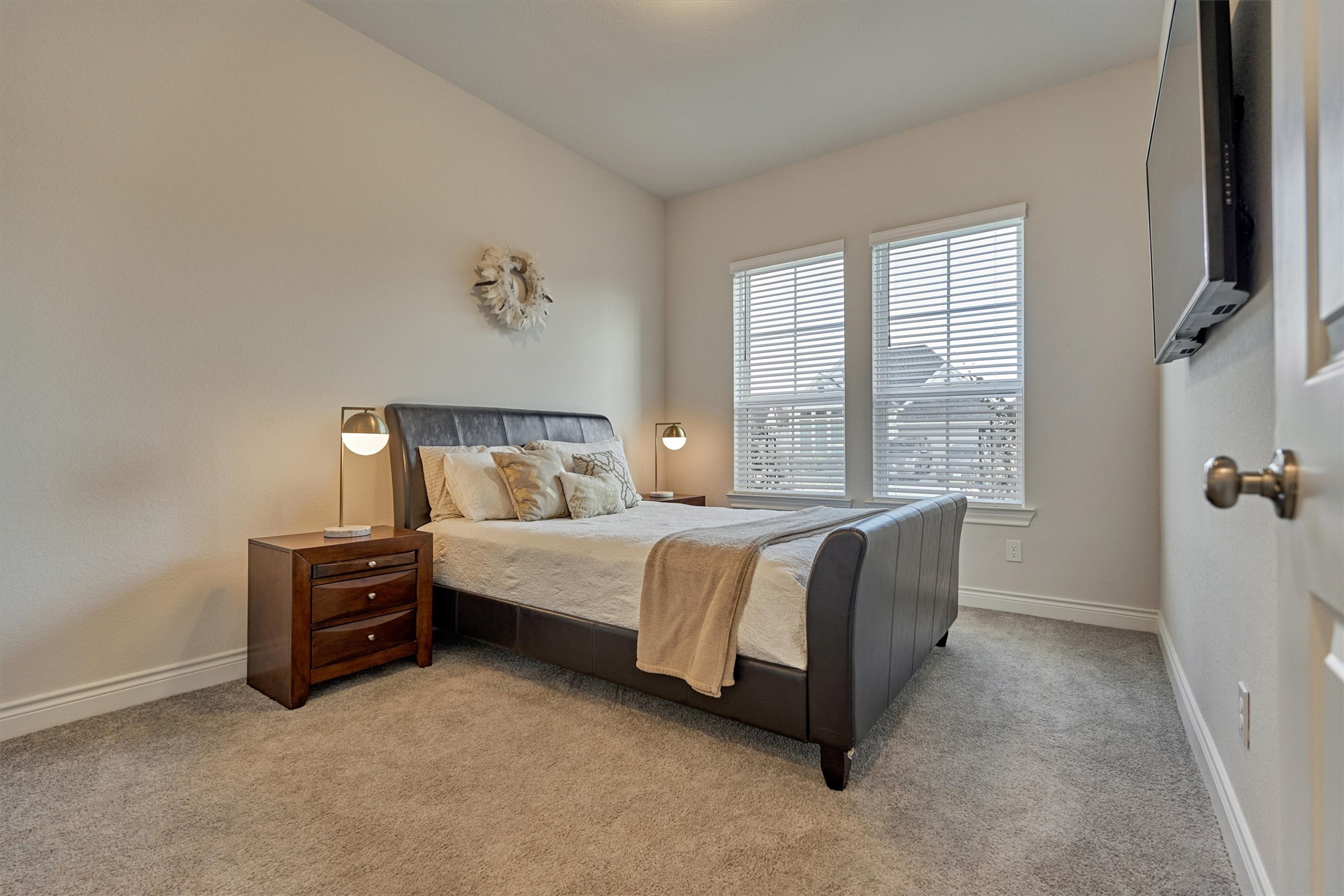 15230 Tree Swallow Court Magnolia, TX 77354 - Photo 8 of 49 a bedroom with a bed and a view of bedroom