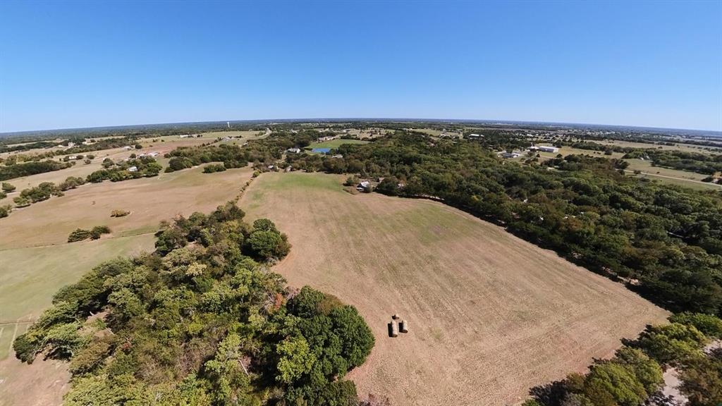 242 Oak Hill Road Van Alstyne, TX 75495 - Photo 6 of 10 Expansive open fields with scattered trees and natural landscaping