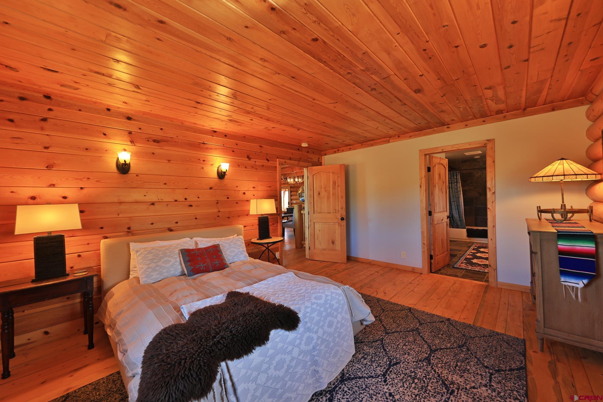 9321 54 Road Molina, CO 81646 - Photo 12 of 32 a bed room with a bed