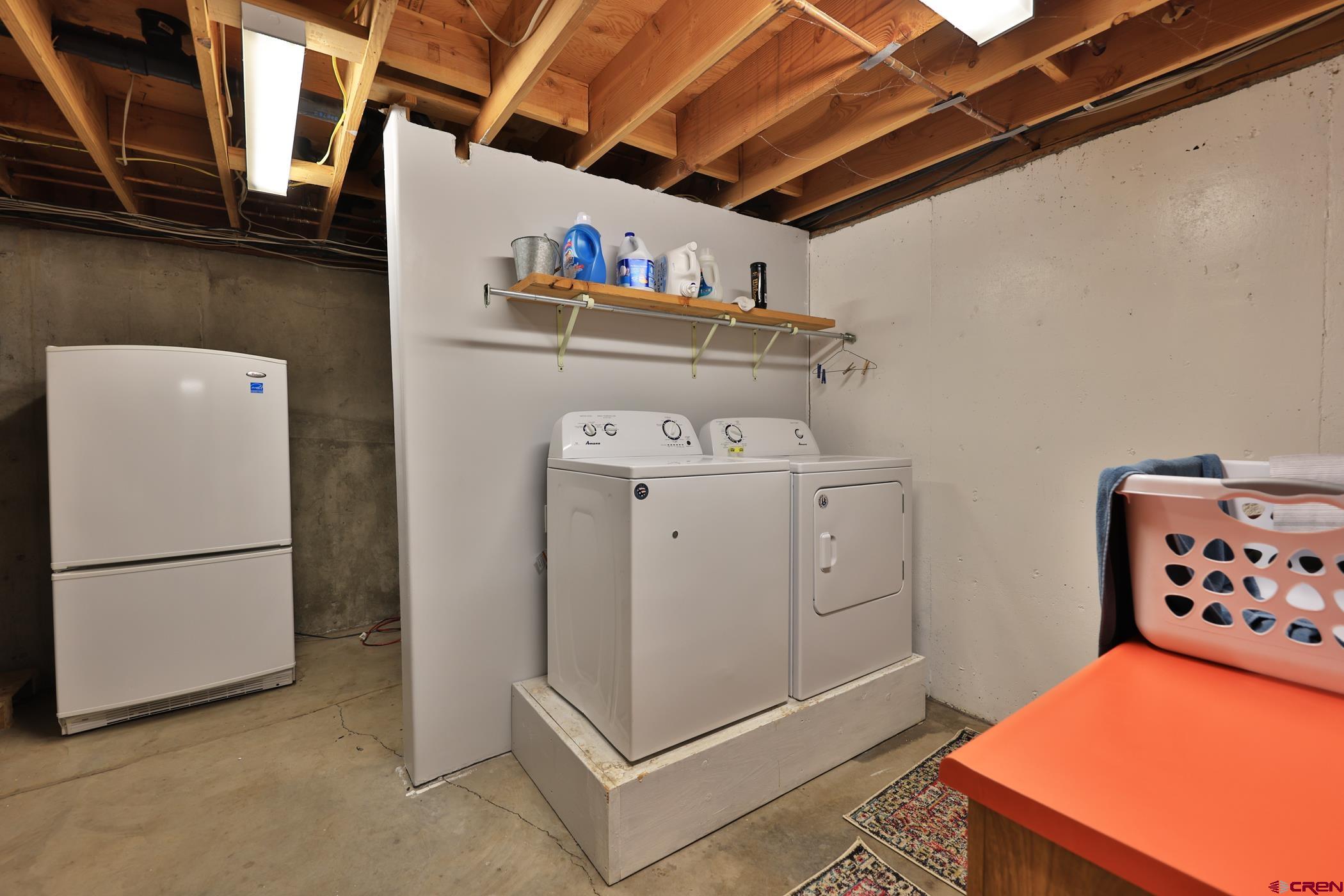 9321 54 Road Molina, CO 81646 - Photo 19 of 32 a utility room with dryer and washer