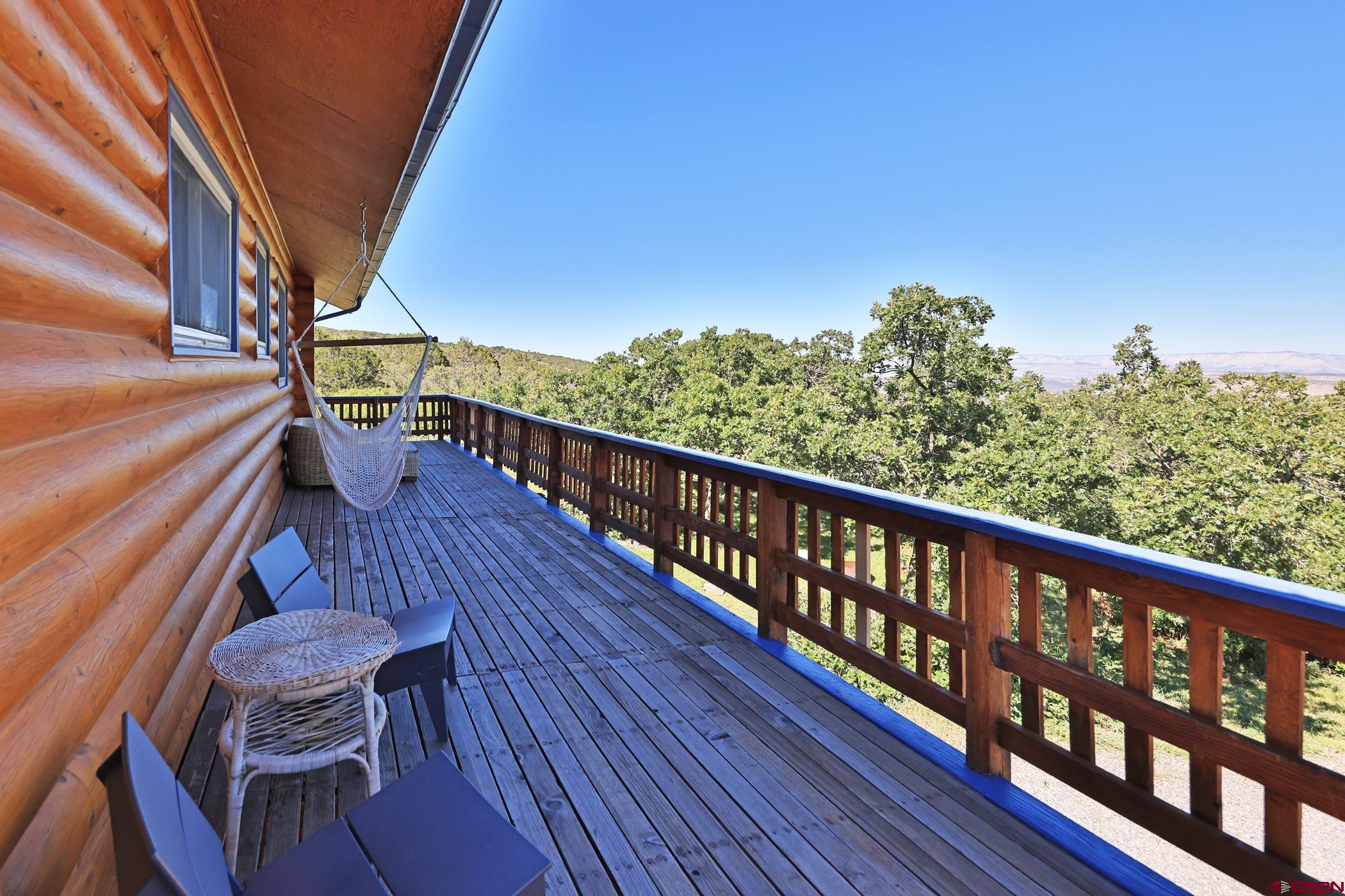 9321 54 Road Molina, CO 81646 - Photo 20 of 32 a view of balcony with wooden floor and seating space