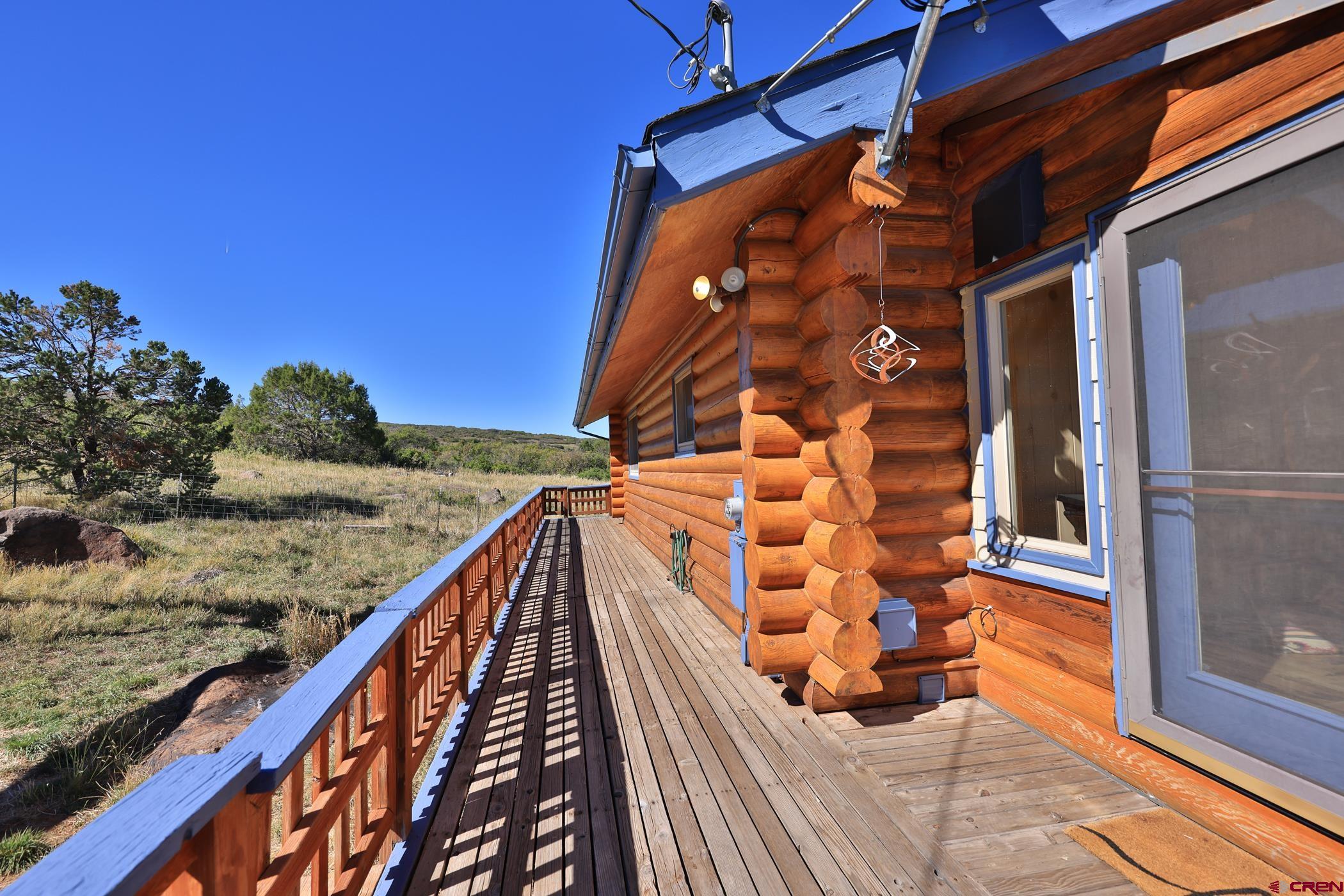 9321 54 Road Molina, CO 81646 - Photo 21 of 32 a balcony with view of the ocean