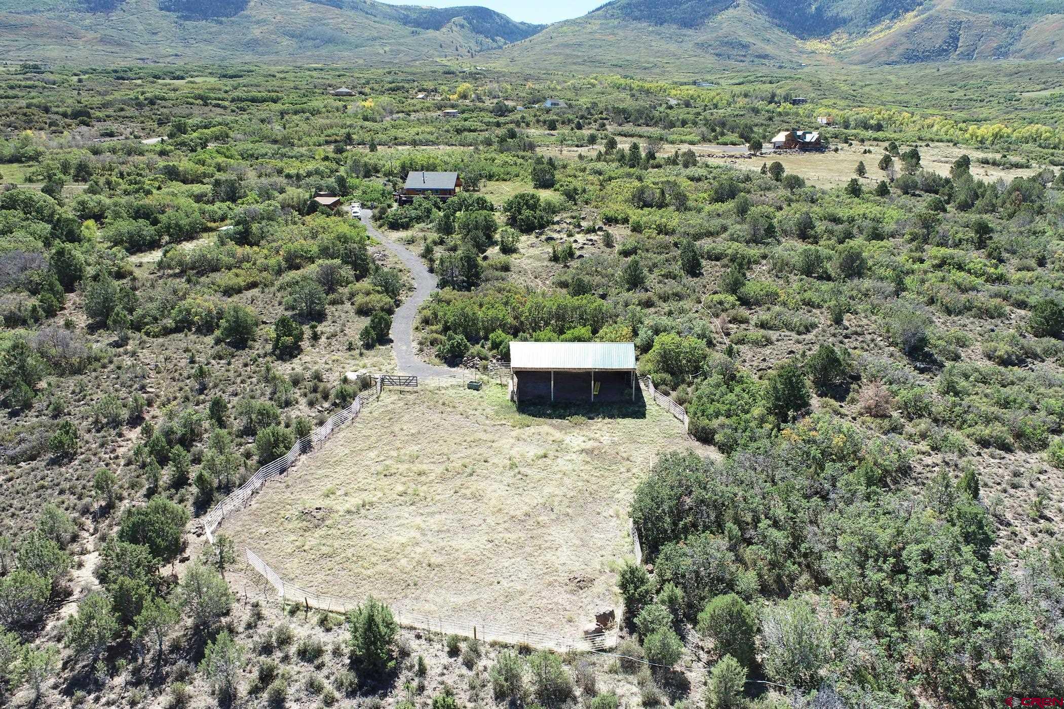 9321 54 Road Molina, CO 81646 - Photo 27 of 32 a view of a dry yard with green space