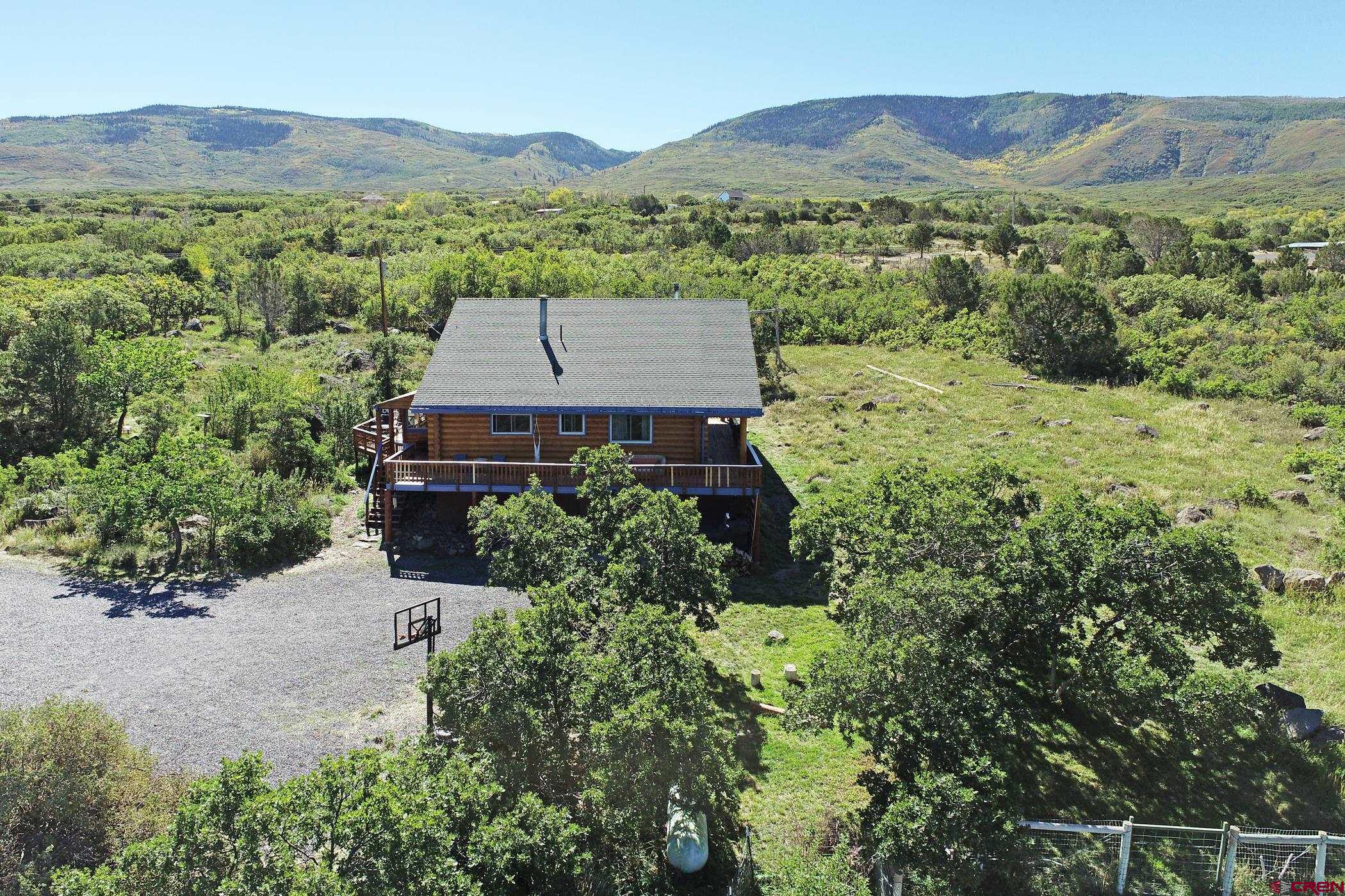 9321 54 Road Molina, CO 81646 - Photo 29 of 32 an aerial view of a house with a garden