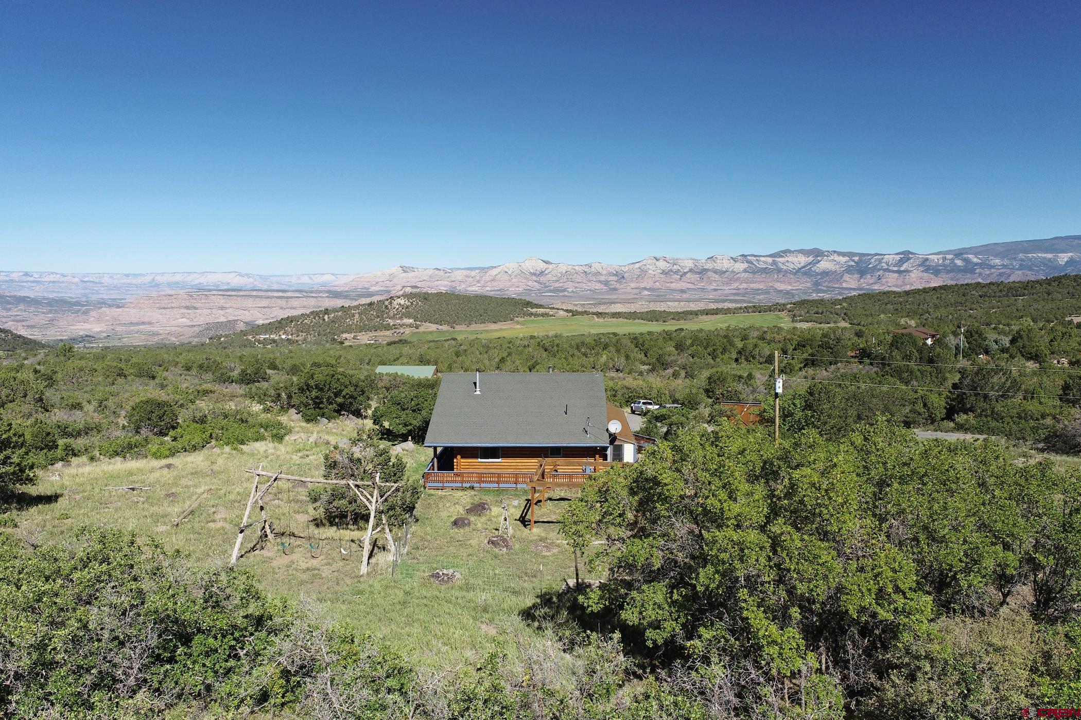 9321 54 Road Molina, CO 81646 - Photo 30 of 32 a view of a city with mountain