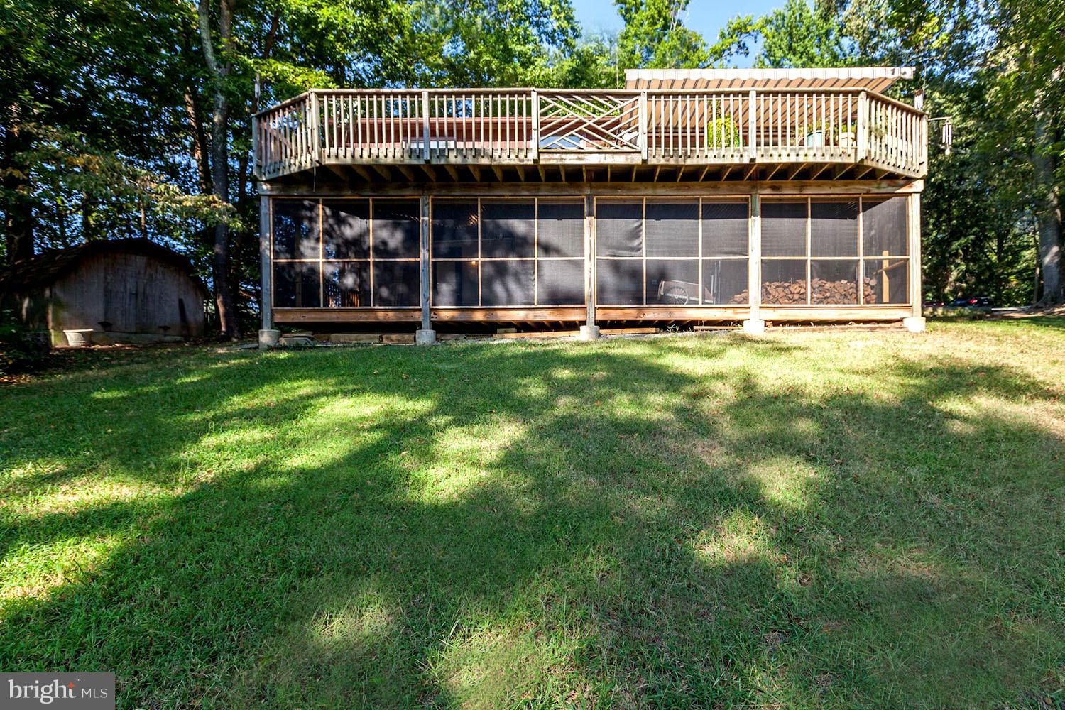 1355 Moyer Road Annapolis, MD 21403 - Photo 3 of 30 Expansive Water View Deck and Screened Porch