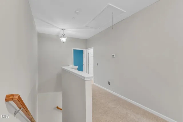 a view of room with window and ceiling fan