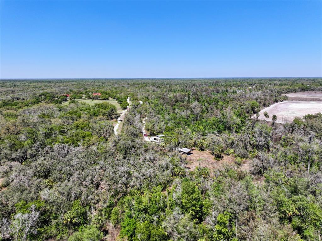 3832 Wildcat Run Road Arcadia, FL 34266 - Photo 1 of 34 a view of a field with an ocean