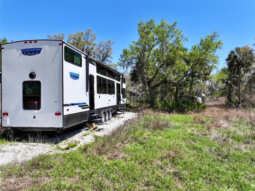 3832 Wildcat Run Road Arcadia, FL 34266 - Photo 3 of 34 a front view of a house with a yard