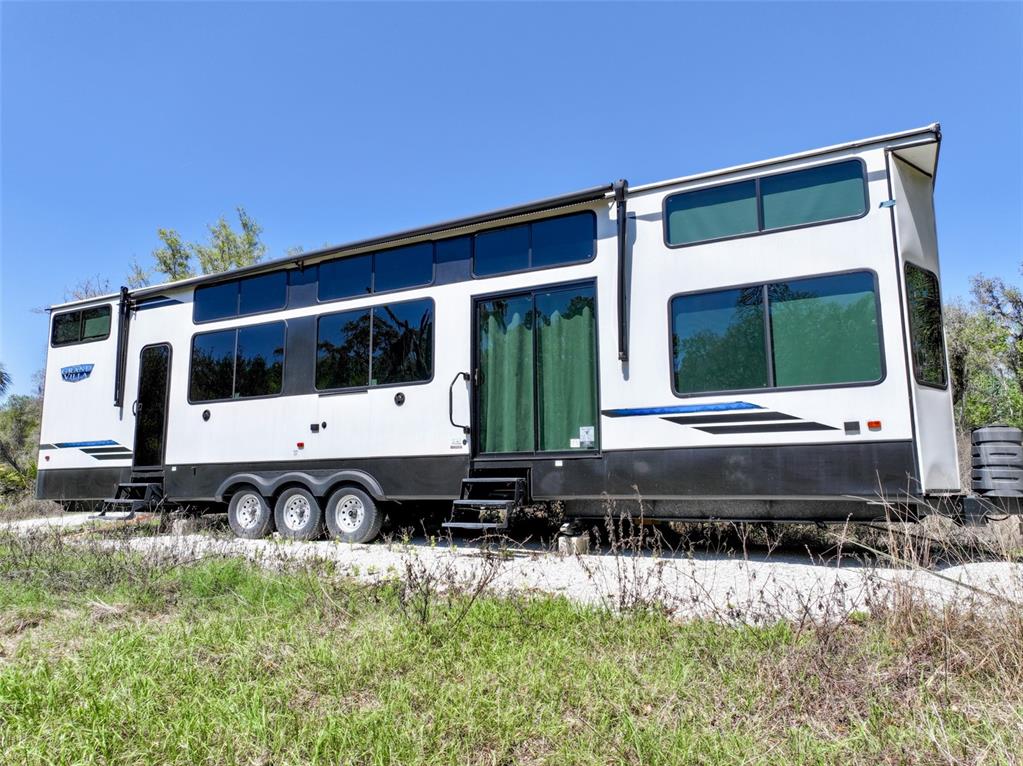 3832 Wildcat Run Road Arcadia, FL 34266 - Photo 6 of 34 a front view of a house with a yard