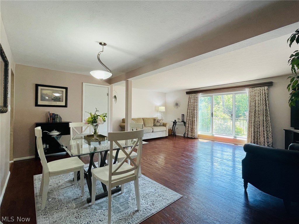 6468 State Road, Unit L10 Cleveland, OH 44134 - Photo 2 of 15 Dining space with hardwood / wood-style floors