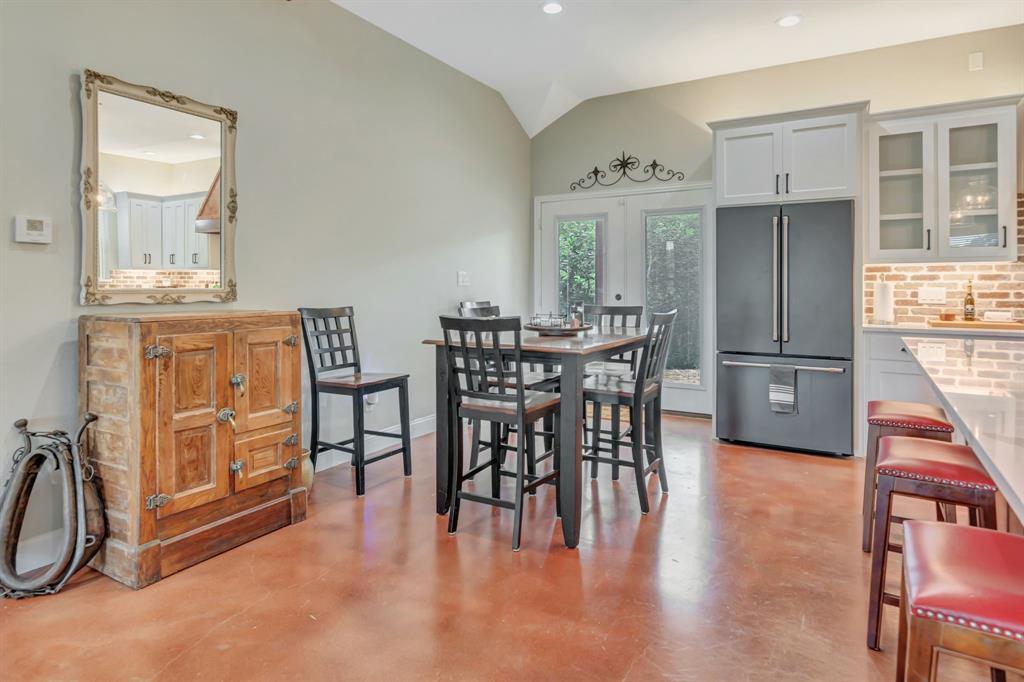 129 Whiskey Rnch Road Runaway Bay, TX 76426 - Photo 13 of 39 a view of a dining room with furniture window and wooden floor
