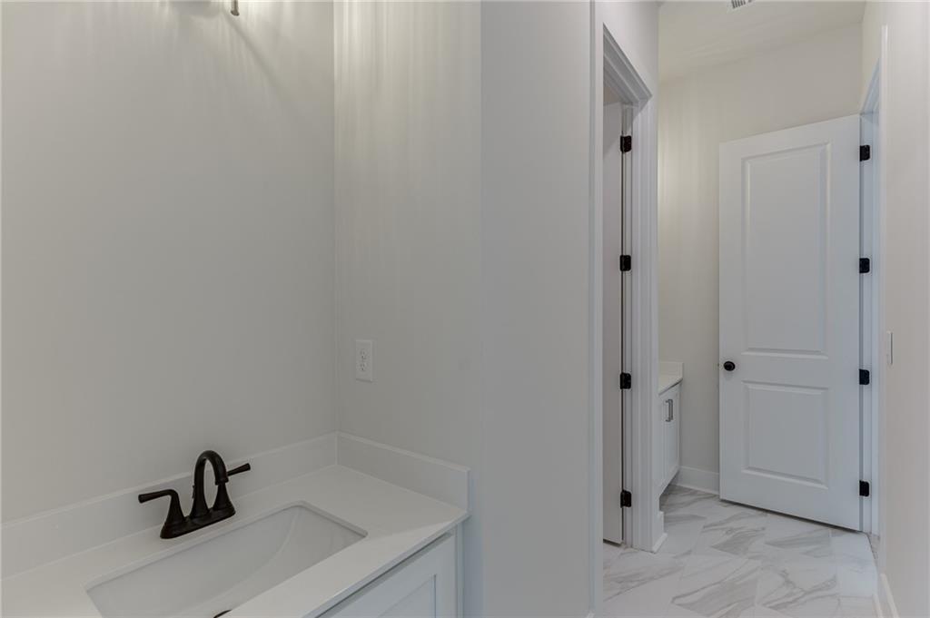 5410 Settingdown Road Cumming, GA 30041 - Photo 13 of 47 a view of bathroom