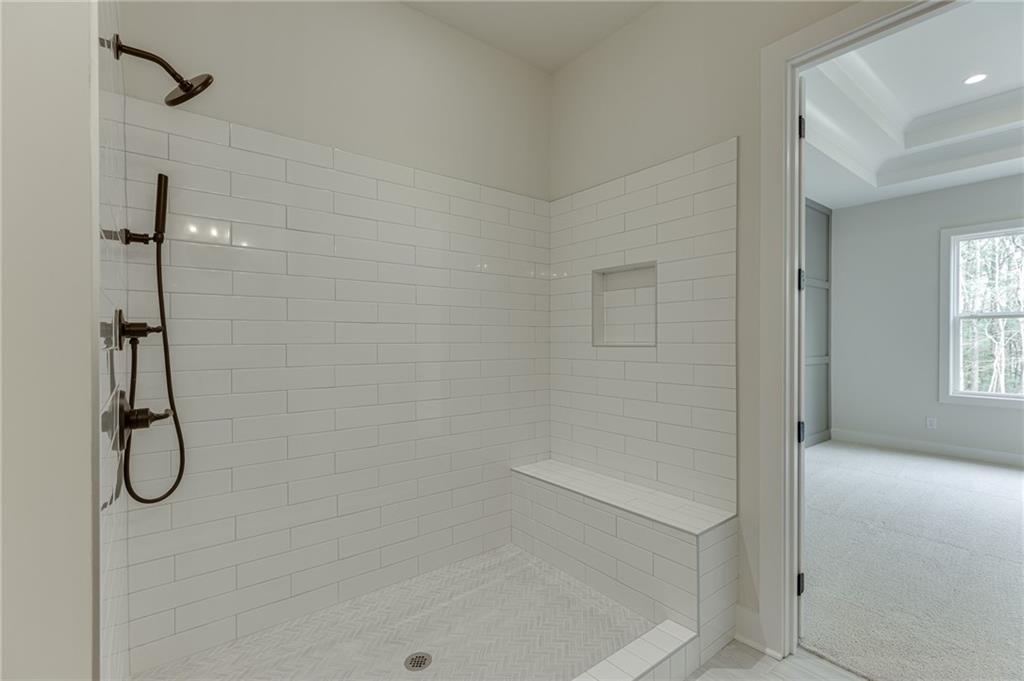 5410 Settingdown Road Cumming, GA 30041 - Photo 34 of 47 a bathroom with a shower