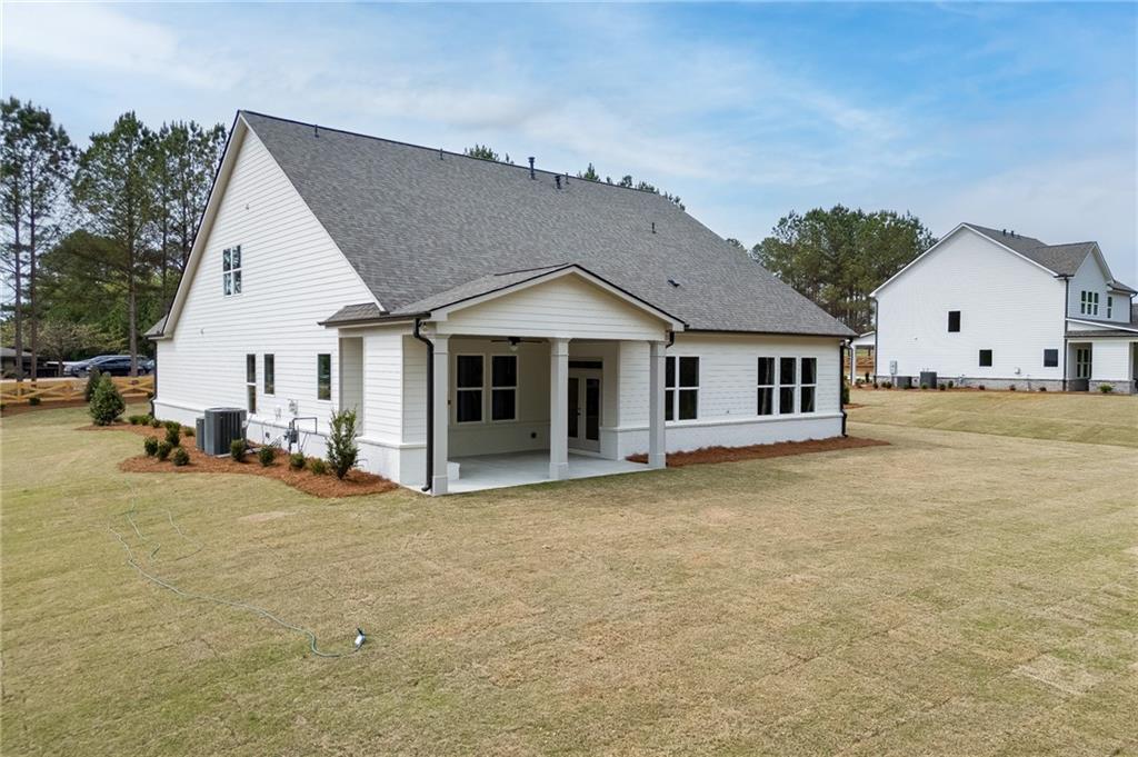 5410 Settingdown Road Cumming, GA 30041 - Photo 42 of 47 a view of a house with a patio