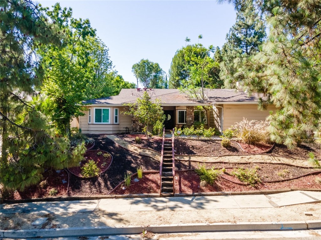 19361 Germain Street Porter Ranch, CA 91326 - Photo 1 of 1 a view of a house with backyard porch and sitting area