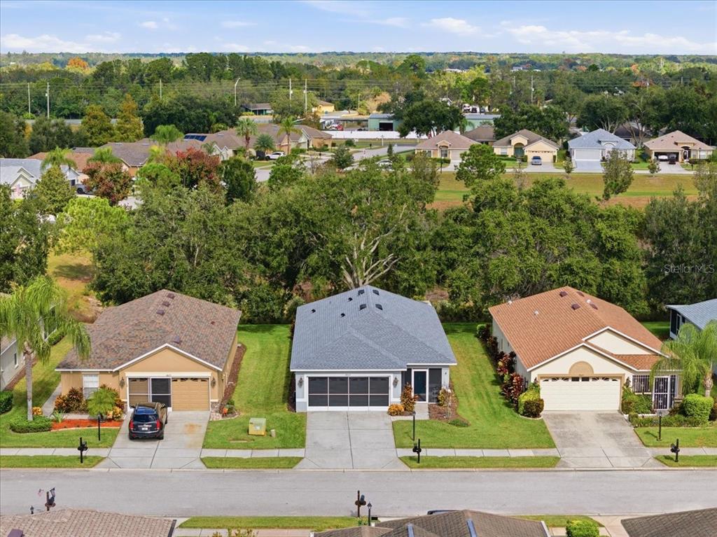 18641 Rolling Hills Loop Hudson, FL 34667 - Photo 3 of 44 an aerial view of multiple houses