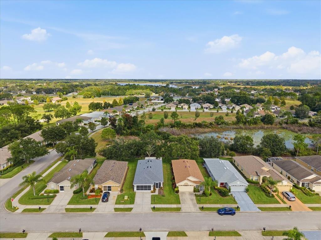 18641 Rolling Hills Loop Hudson, FL 34667 - Photo 39 of 44 an aerial view of residential houses with outdoor space