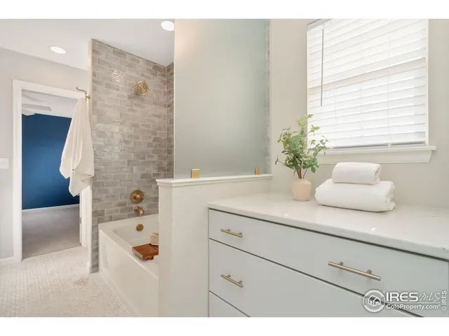 a bathroom with a sink and a bathtub