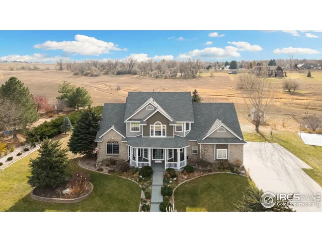 a aerial view of a house with a garden