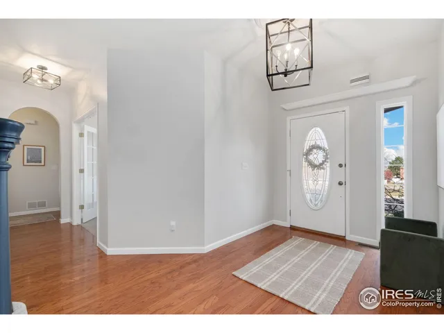 view of empty room with wooden floor