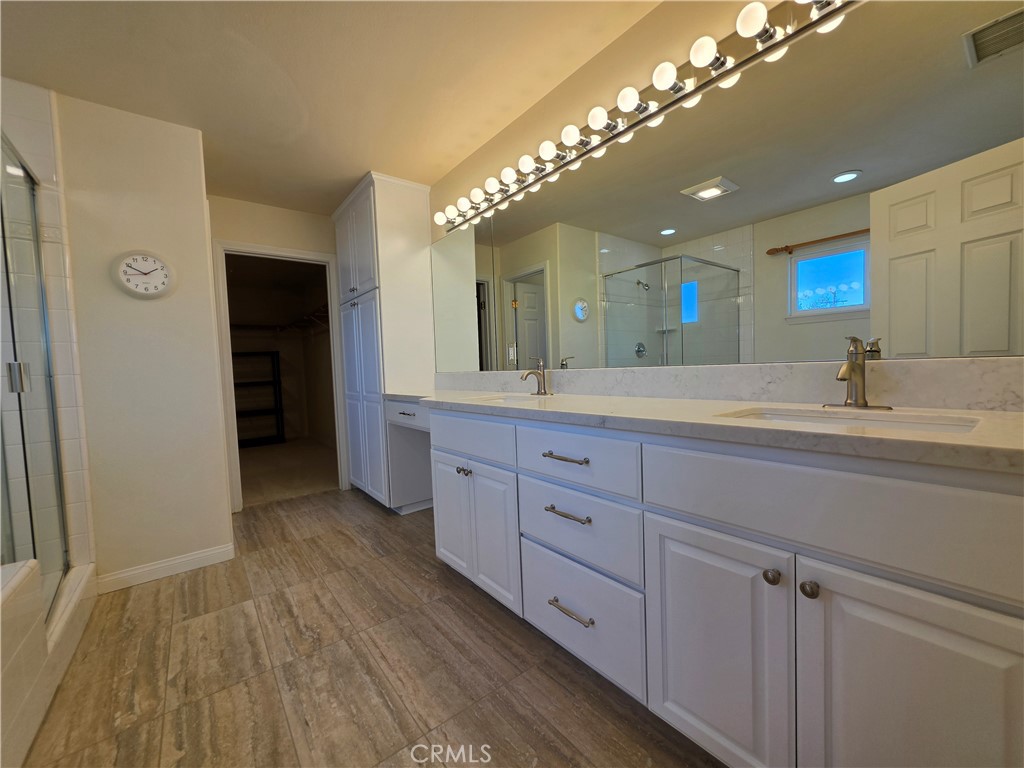 11541 Donovan Road Rossmoor, CA 90720 - Photo 61 of 113 Primary Bathroom dual sinks quartz slab