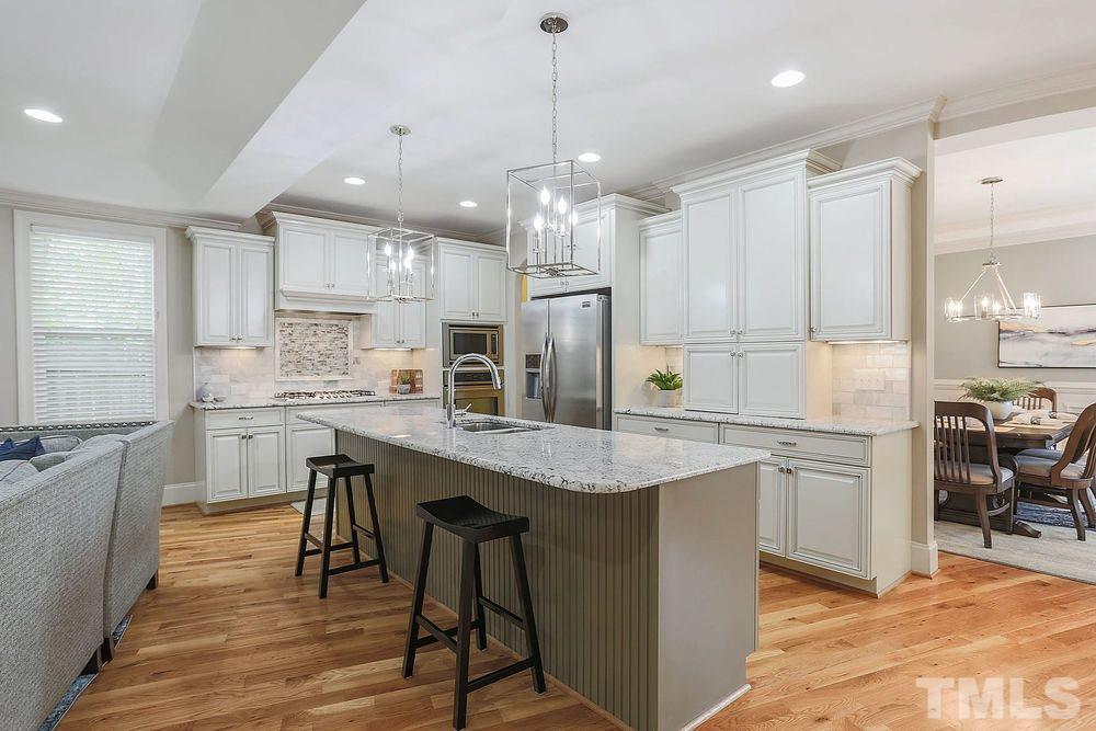 5819 Faringdon Place Raleigh, NC 27609 - Photo 6 of 30
