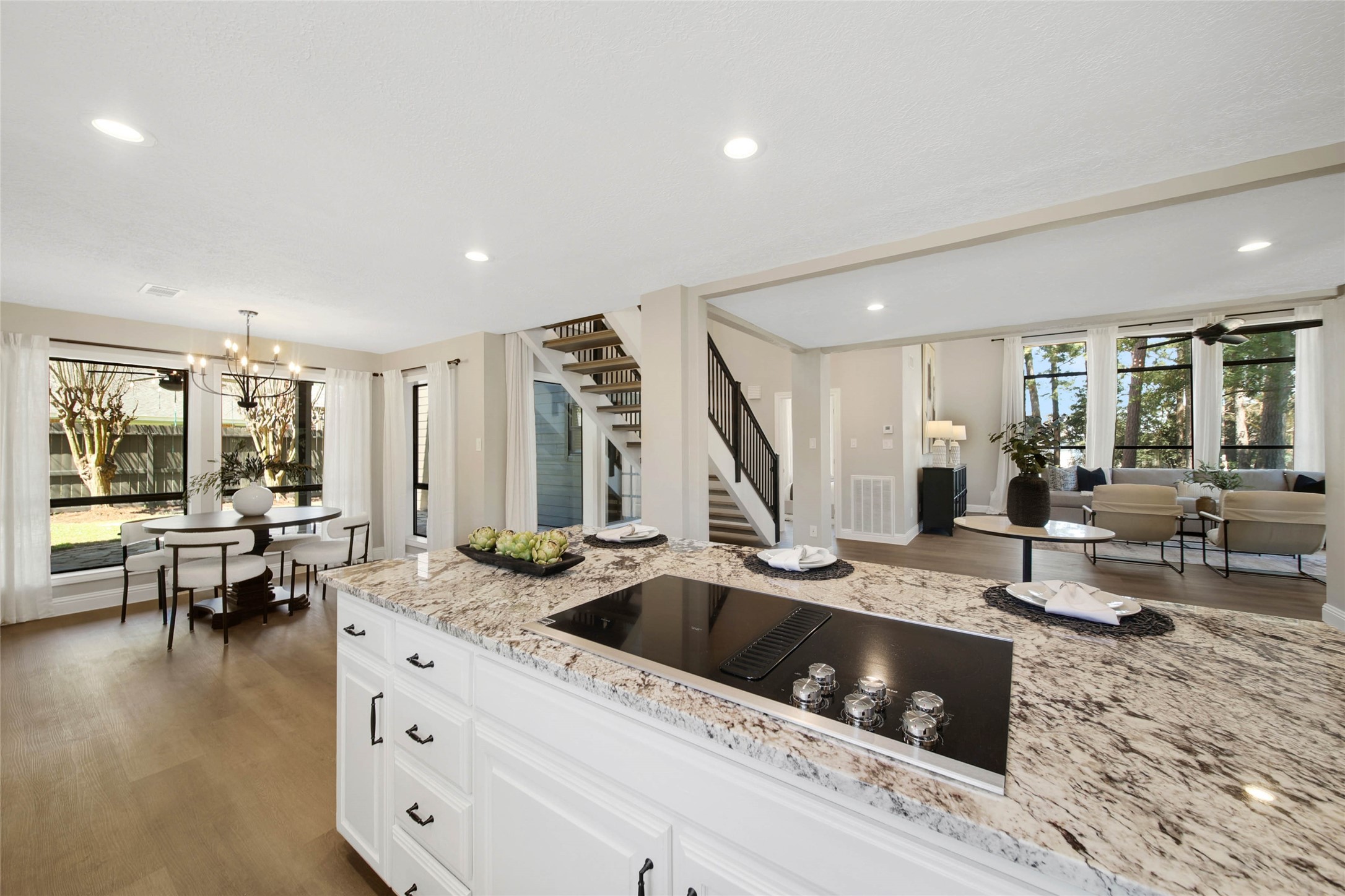 14520 Diamondhead North Conroe, TX 77356 - Photo 15 of 50 Large island, breakfast nook and floating staircase.