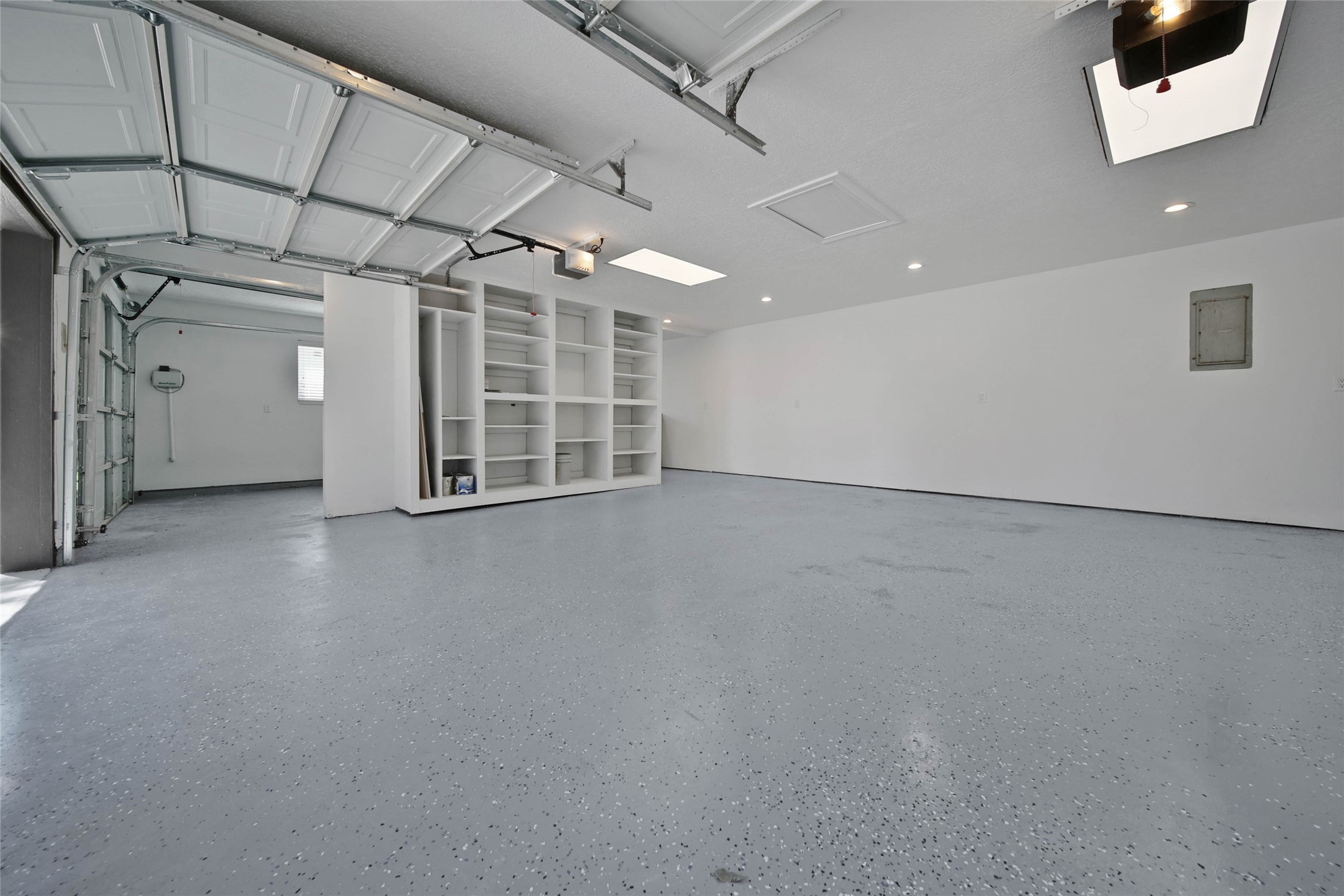14520 Diamondhead North Conroe, TX 77356 - Photo 37 of 50 Epoxy floors in large 3 car garage.