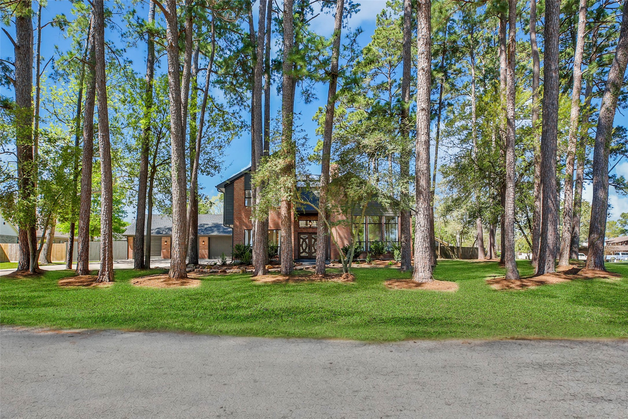 14520 Diamondhead North Conroe, TX 77356 - Photo 4 of 50 Beautiful mature trees for privacy and shade spread over 2 lots.
