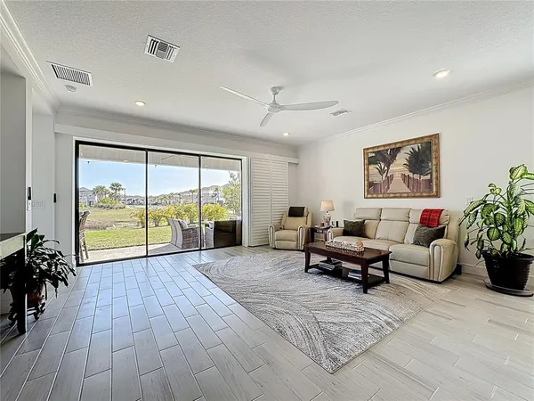 a large bathroom with a double vanity sink a mirror and a bathtub