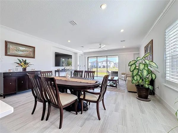a bathroom with a sink a toilet and a shower