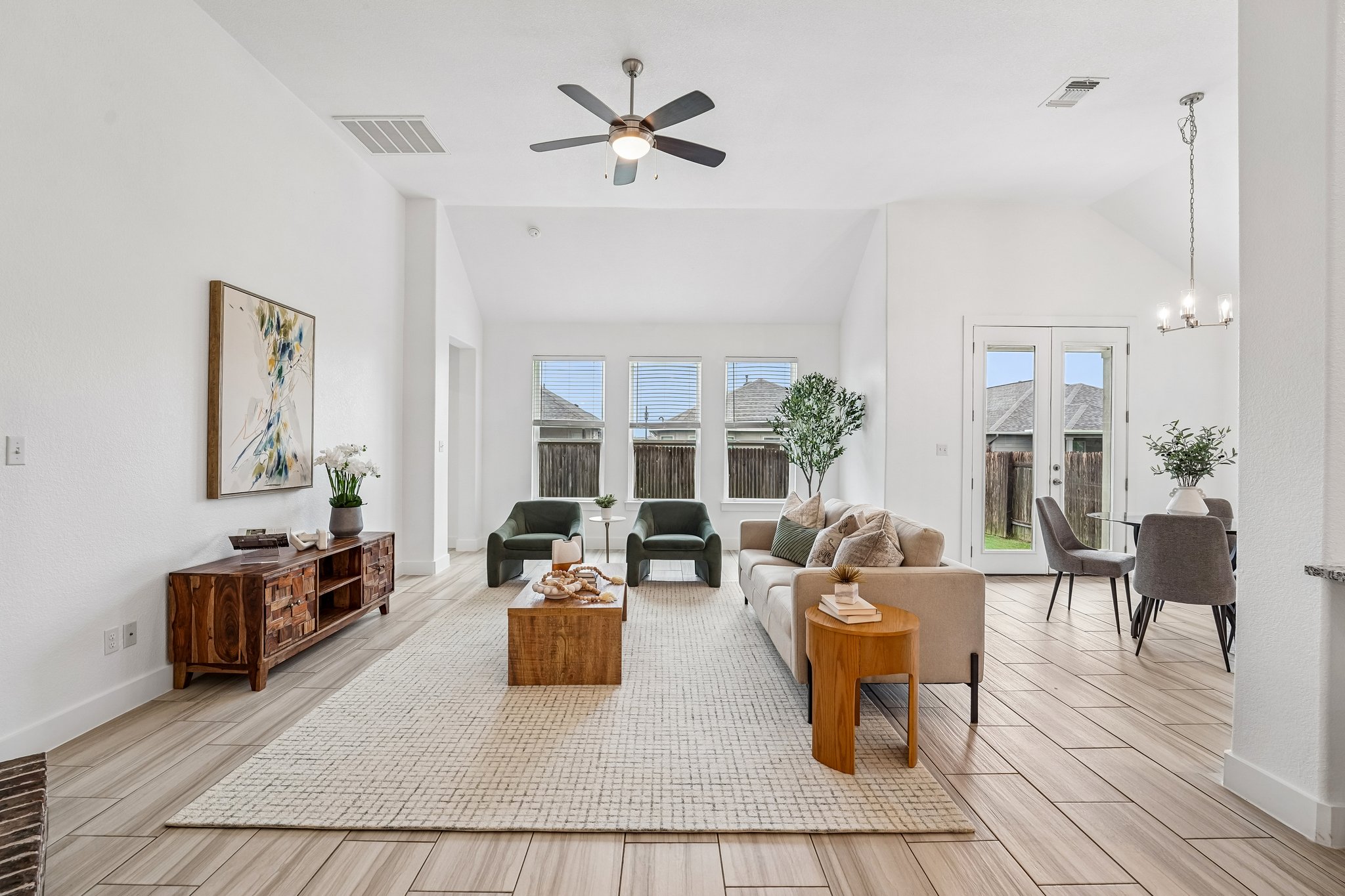 201 Potts Street Georgetown, TX 78628 - Photo 5 of 27 From the foyer, the undeniable scale of the home is on full display through its thoughtfully designed 2,912 sq ft space.
