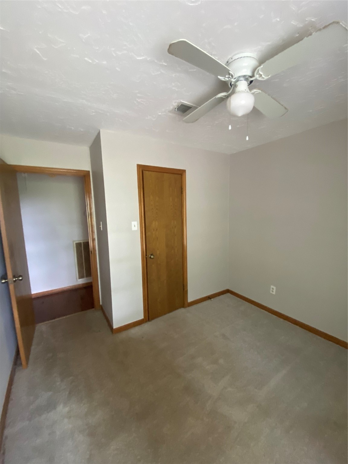 8720 Janda Road Fairchilds, TX 77469 - Photo 12 of 13 an empty room with fan and entrance