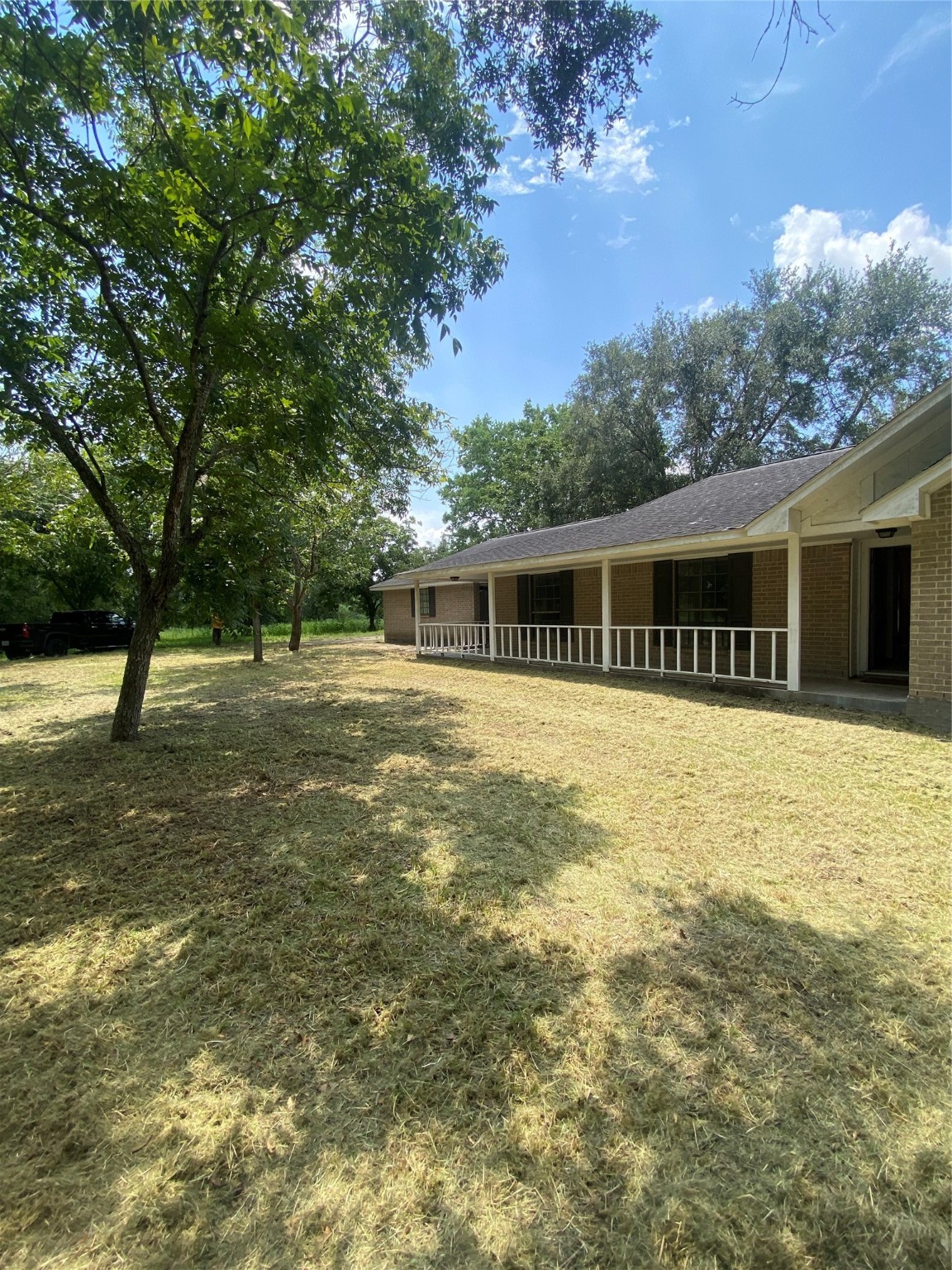 8720 Janda Road Fairchilds, TX 77469 - Photo 2 of 13 a swimming pool with trees in the background