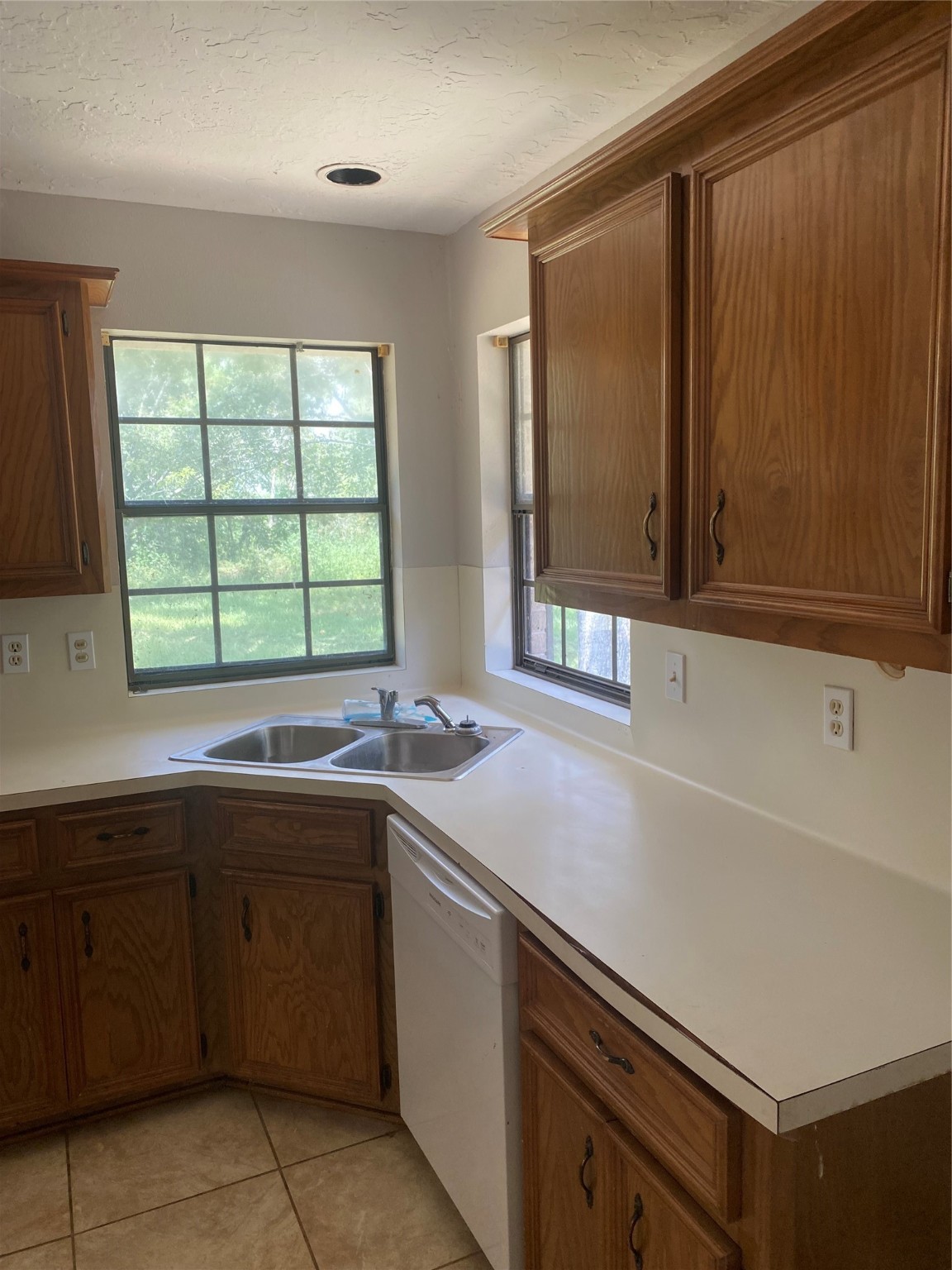 8720 Janda Road Fairchilds, TX 77469 - Photo 6 of 13 a kitchen with a sink and cabinets