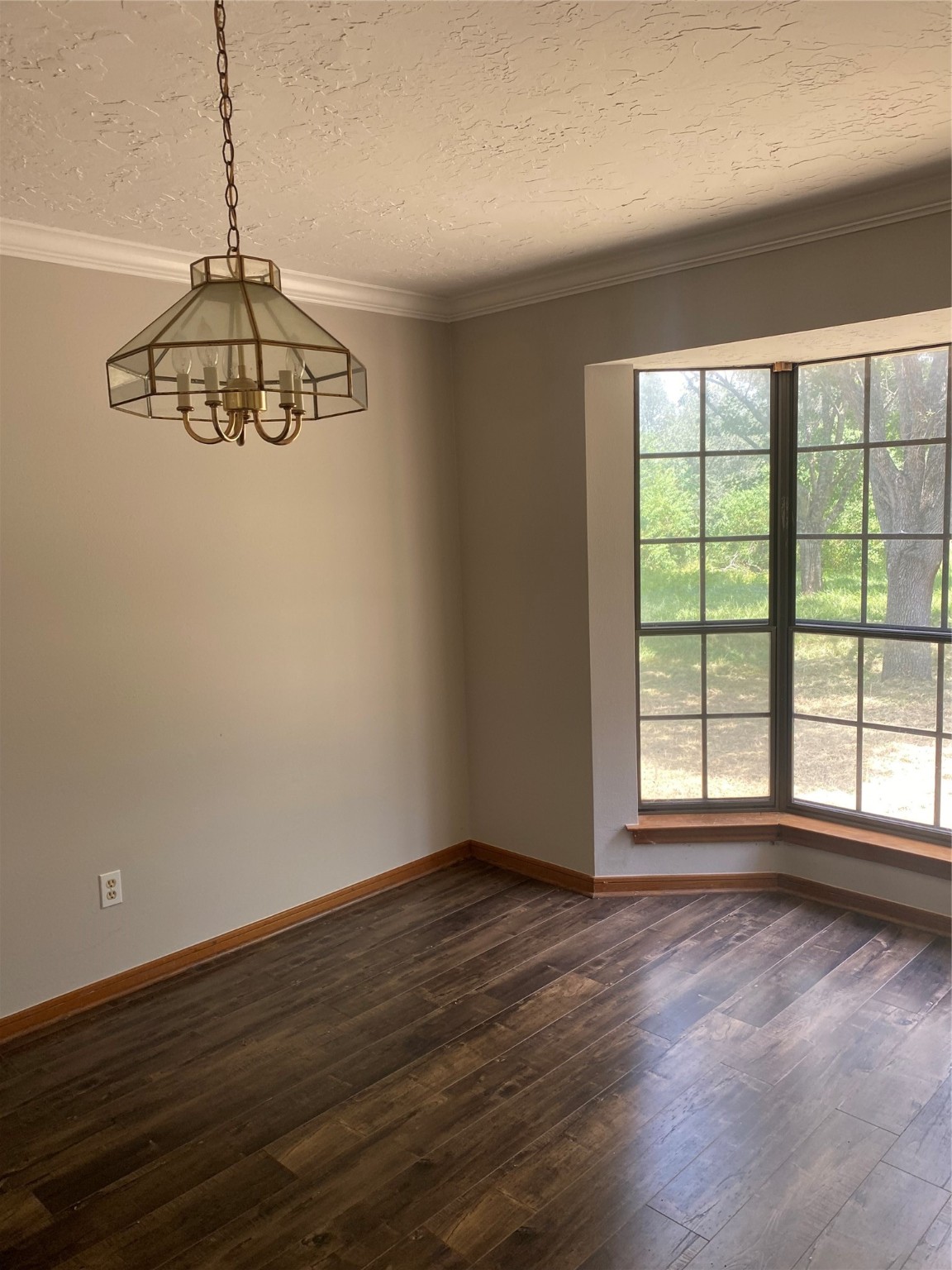 8720 Janda Road Fairchilds, TX 77469 - Photo 7 of 13 a view of a big room with wooden floor and windows
