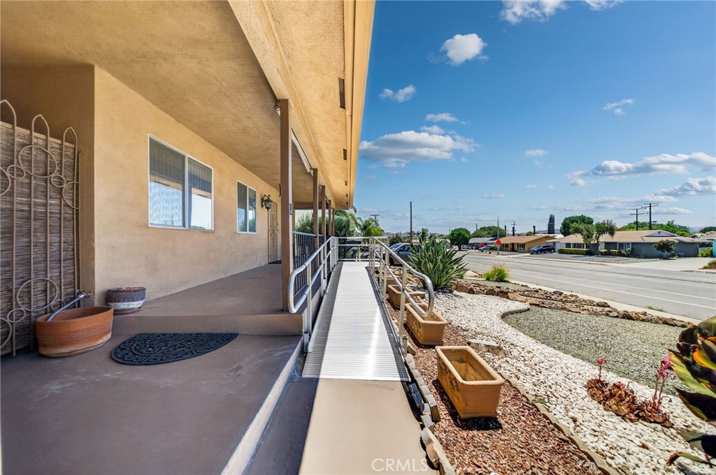 29078 Bradley Road Menifee, CA 92586 - Photo 5 of 42 a view of a balcony with car parked
