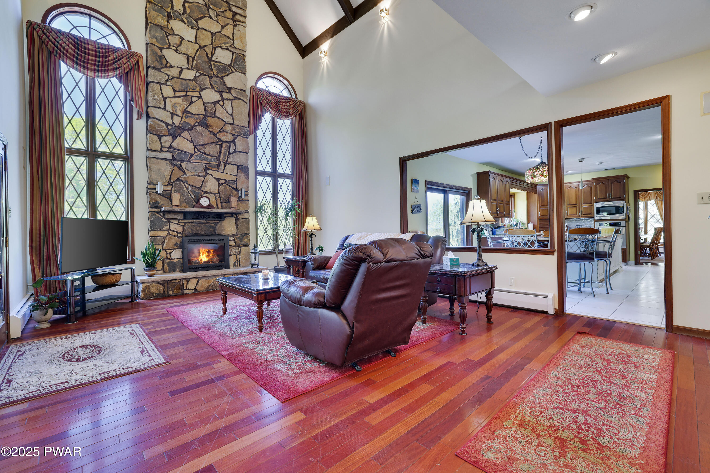 555 Valley View Road Dallas, PA 18612 - Photo 29 of 99 a living room with furniture and a fireplace