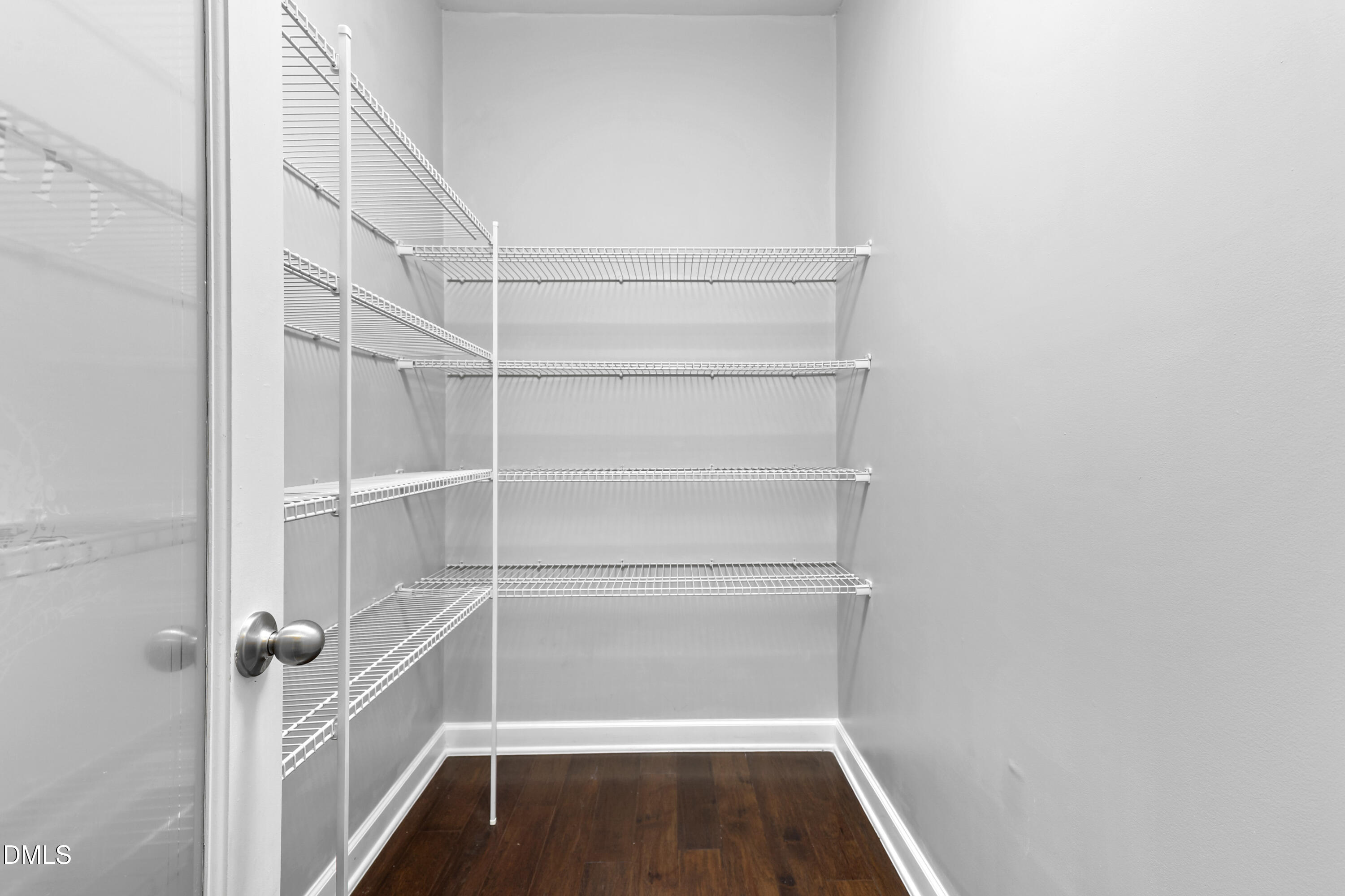 2039 Travern Drive Raleigh, NC 27603 - Photo 14 of 49 a view of walk in closet with empty racks