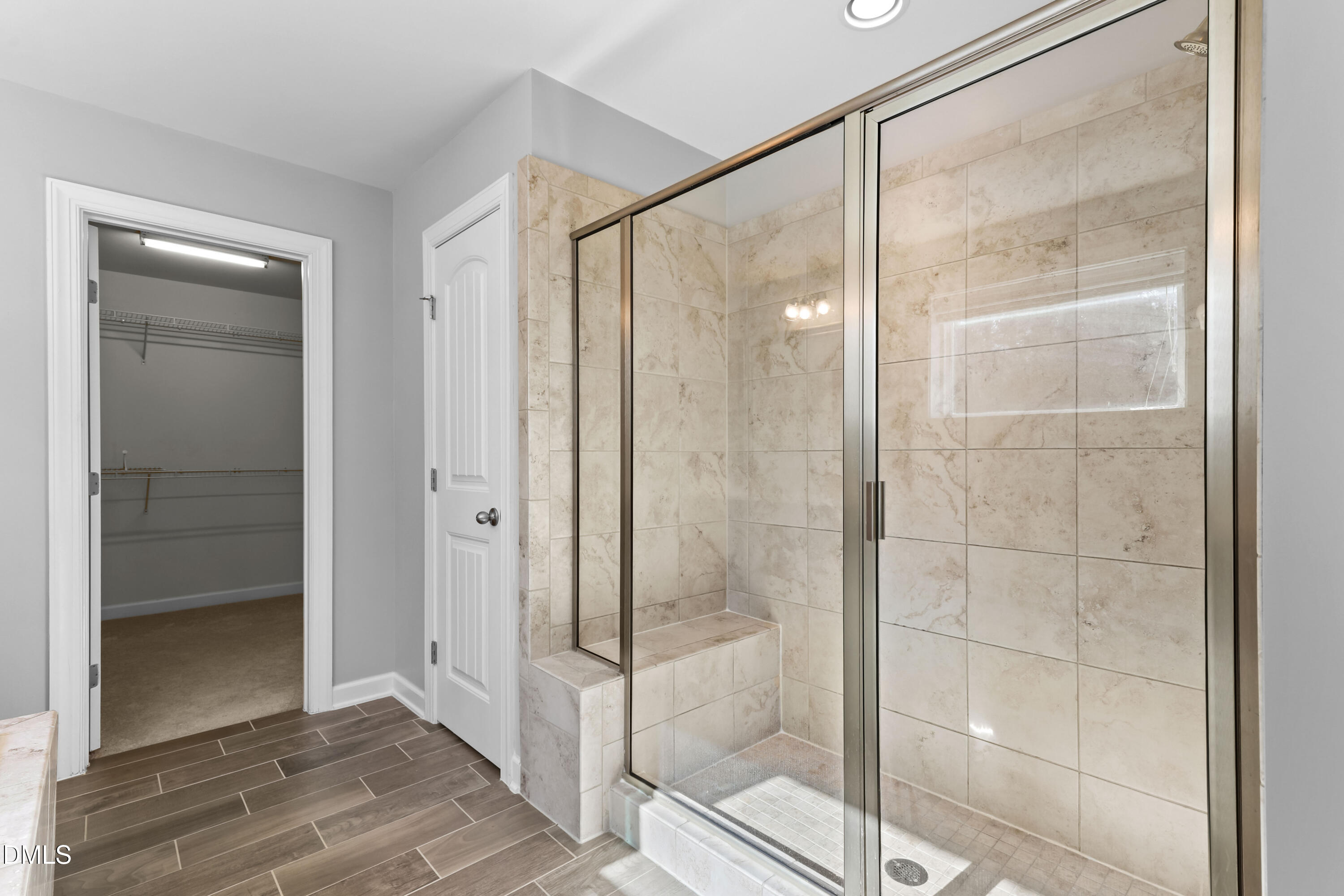 2039 Travern Drive Raleigh, NC 27603 - Photo 29 of 49 a bathroom with a glass shower door