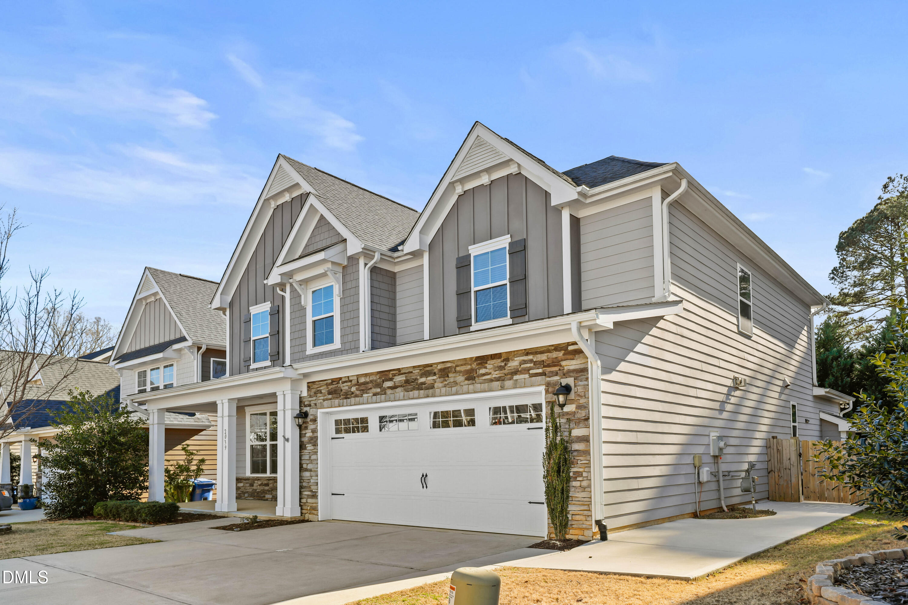 2039 Travern Drive Raleigh, NC 27603 - Photo 3 of 49 a view of a white building among the street and a building