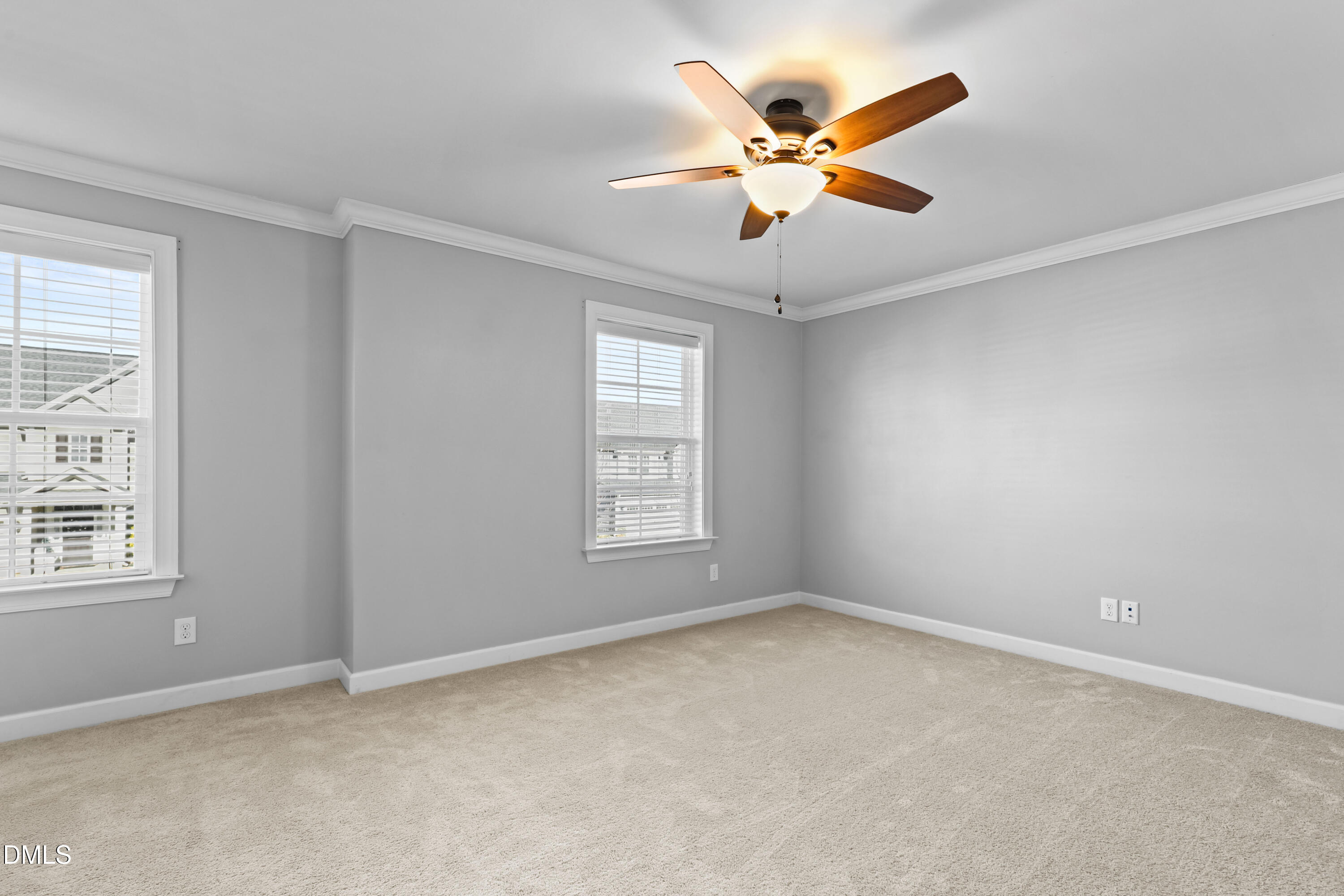 2039 Travern Drive Raleigh, NC 27603 - Photo 33 of 49 an empty room with window and ceiling fan