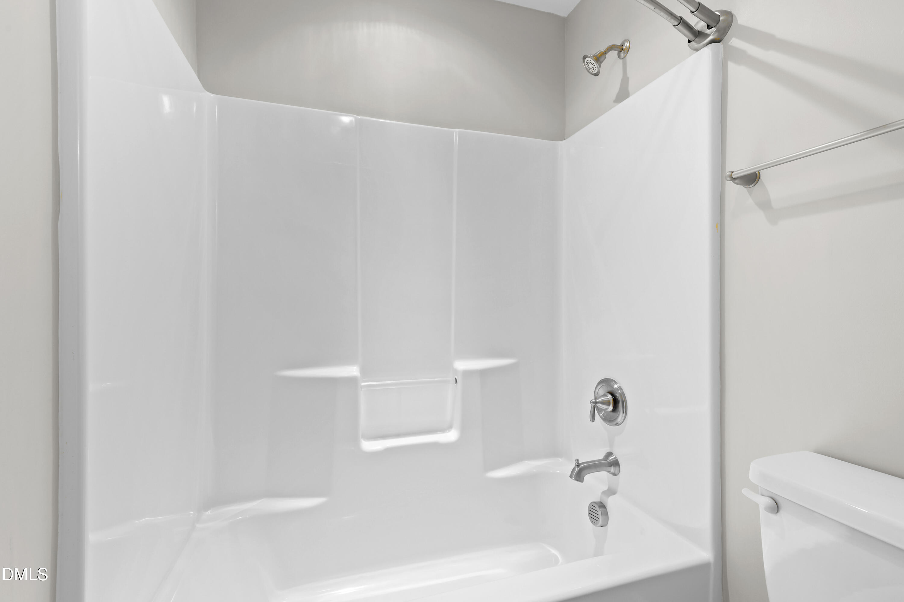 2039 Travern Drive Raleigh, NC 27603 - Photo 37 of 49 a bathroom with a bathtub and a toilet