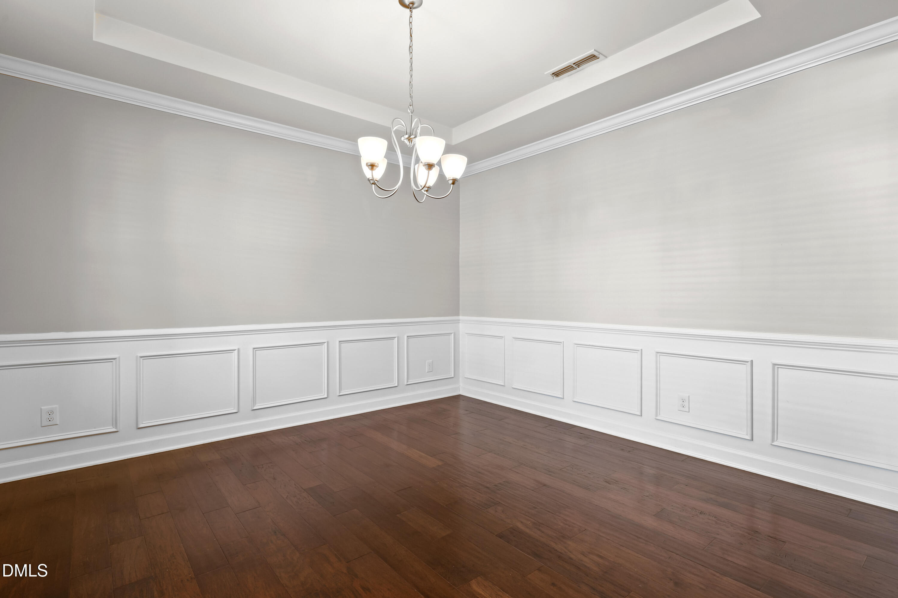 2039 Travern Drive Raleigh, NC 27603 - Photo 4 of 49 a view of an empty room with chandelier
