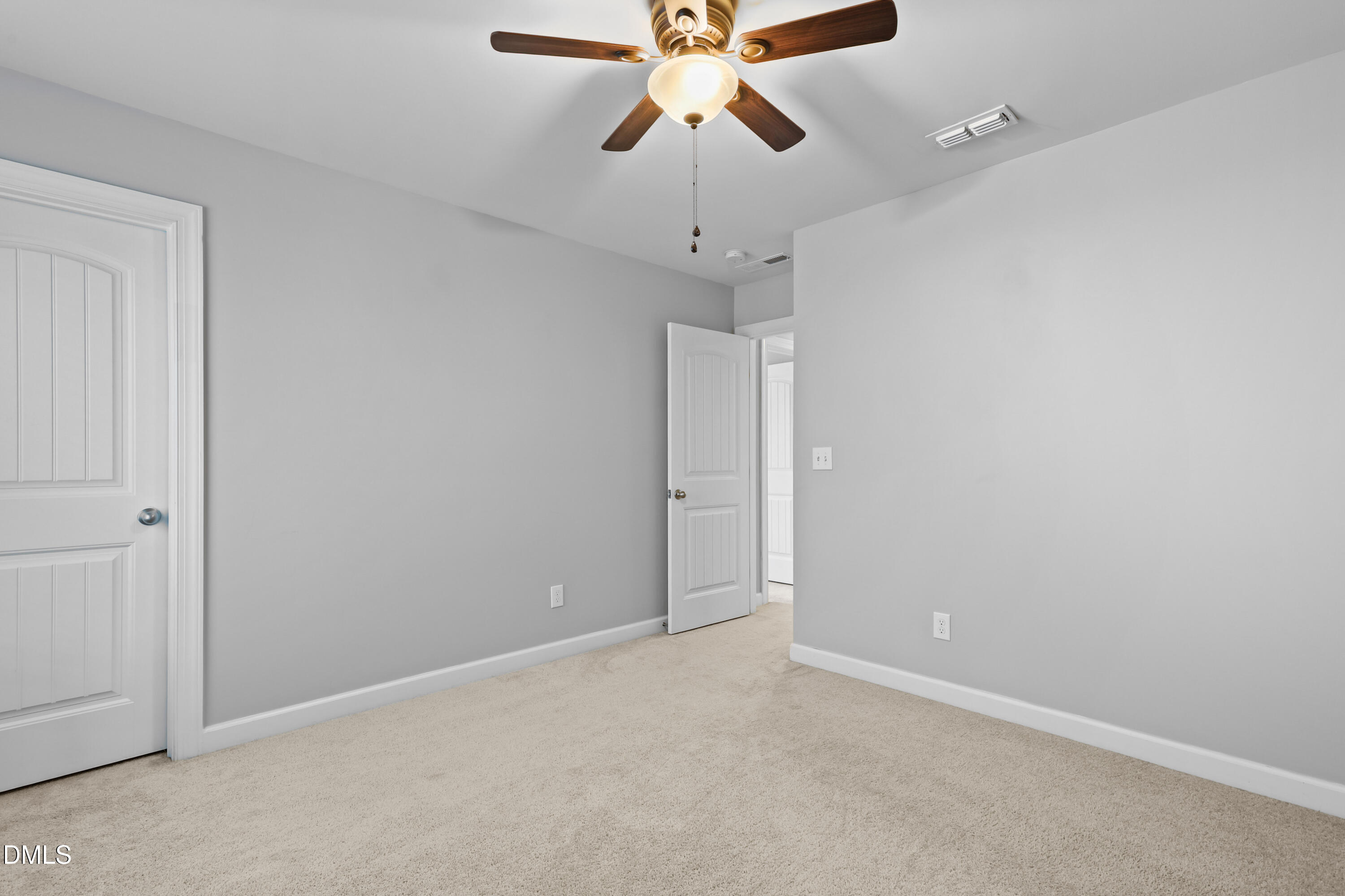 2039 Travern Drive Raleigh, NC 27603 - Photo 41 of 49 en empty room with chandelier fan